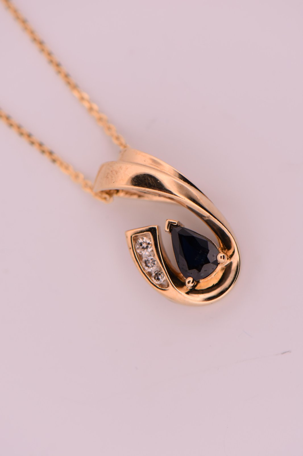 Sapphire Slide Pendant 10ky s.75ct pear d.09ct