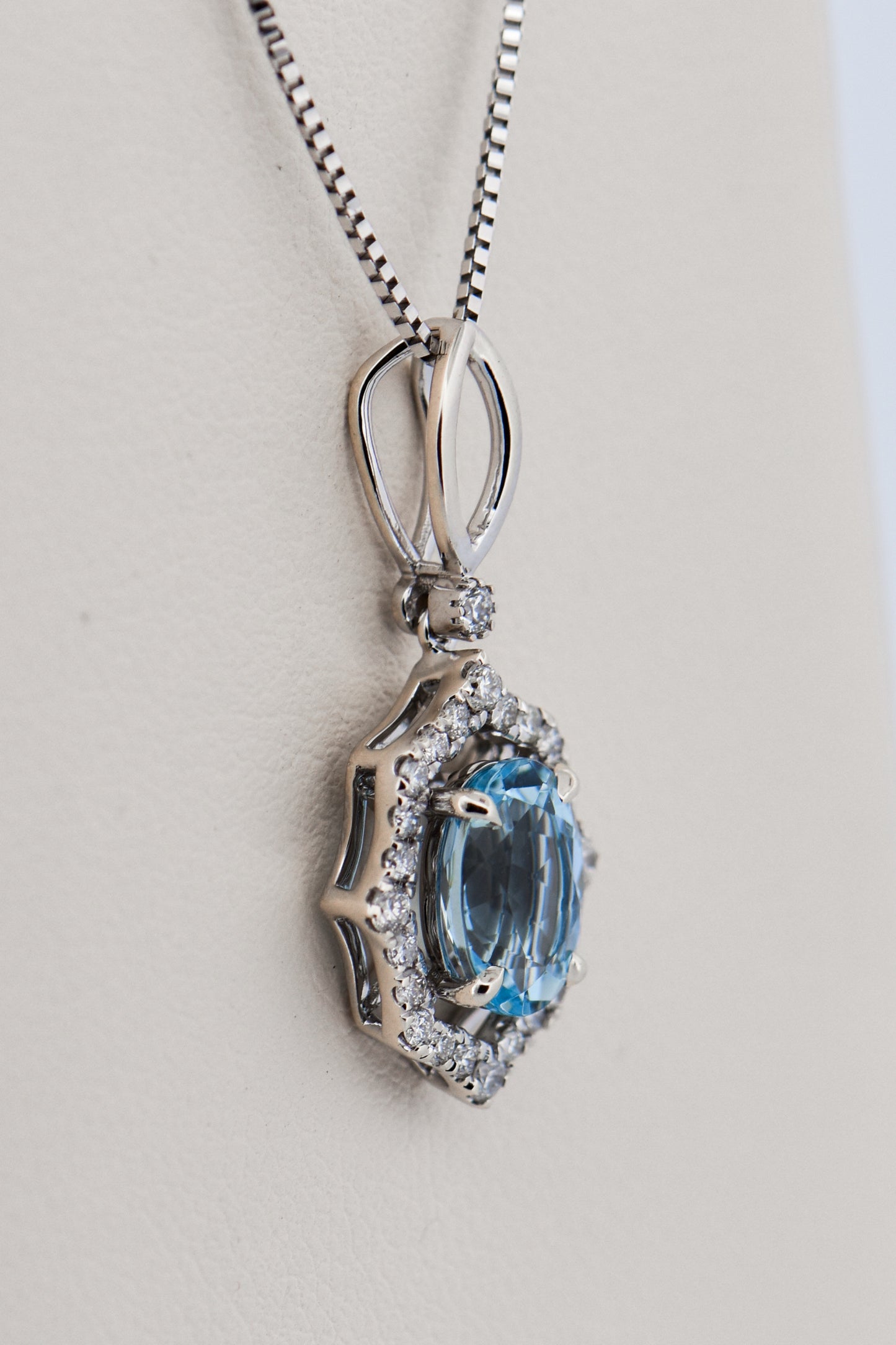 Oval Aquamarine & Diamond Modern Halo Pendant