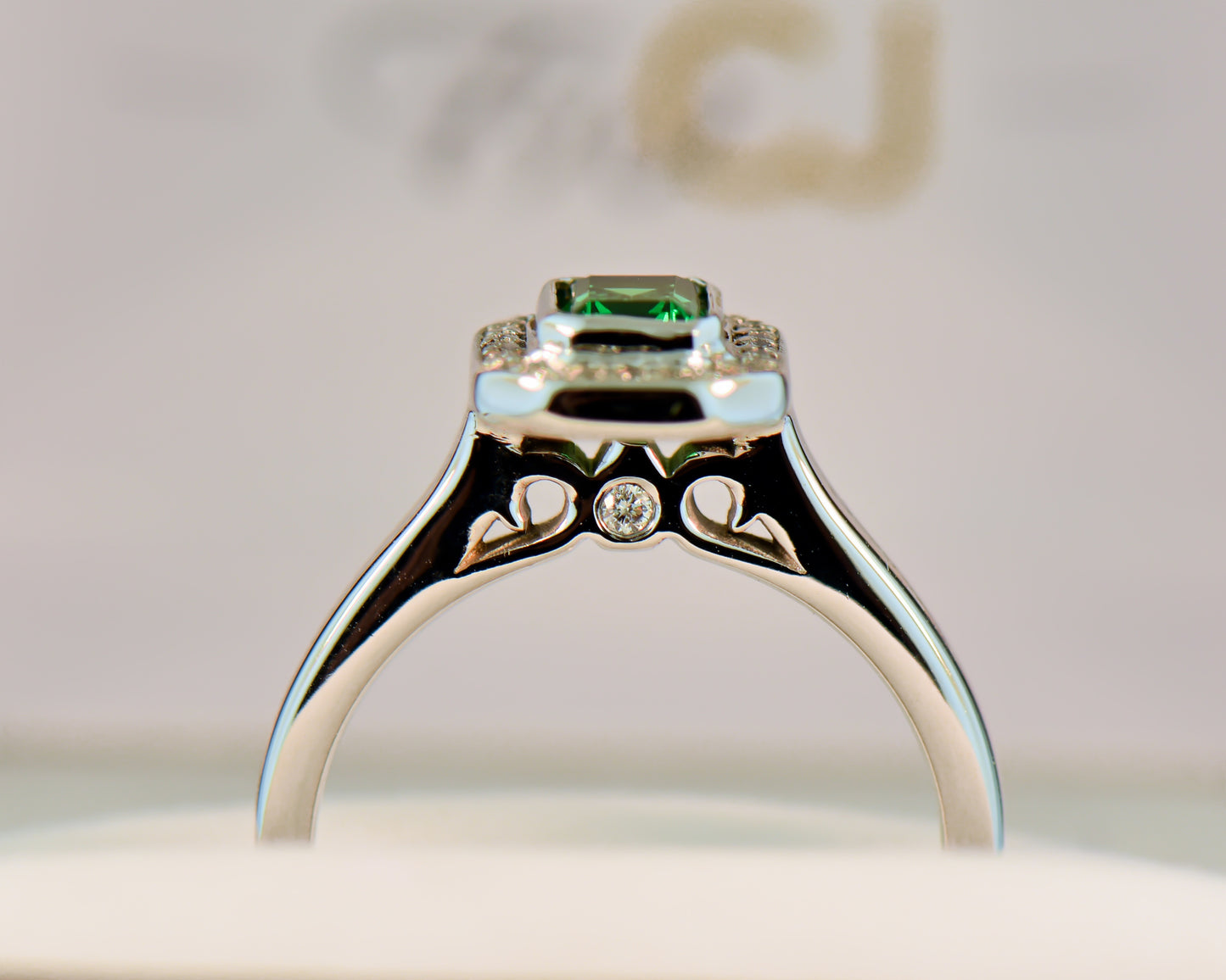 Bezel Set Emerald Cut Tsavorite Garnet & Diamond Ring
