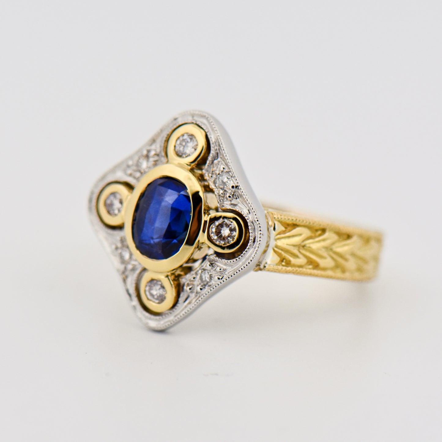 Custom Carved Gold Ring with Royal Blue Sapphire