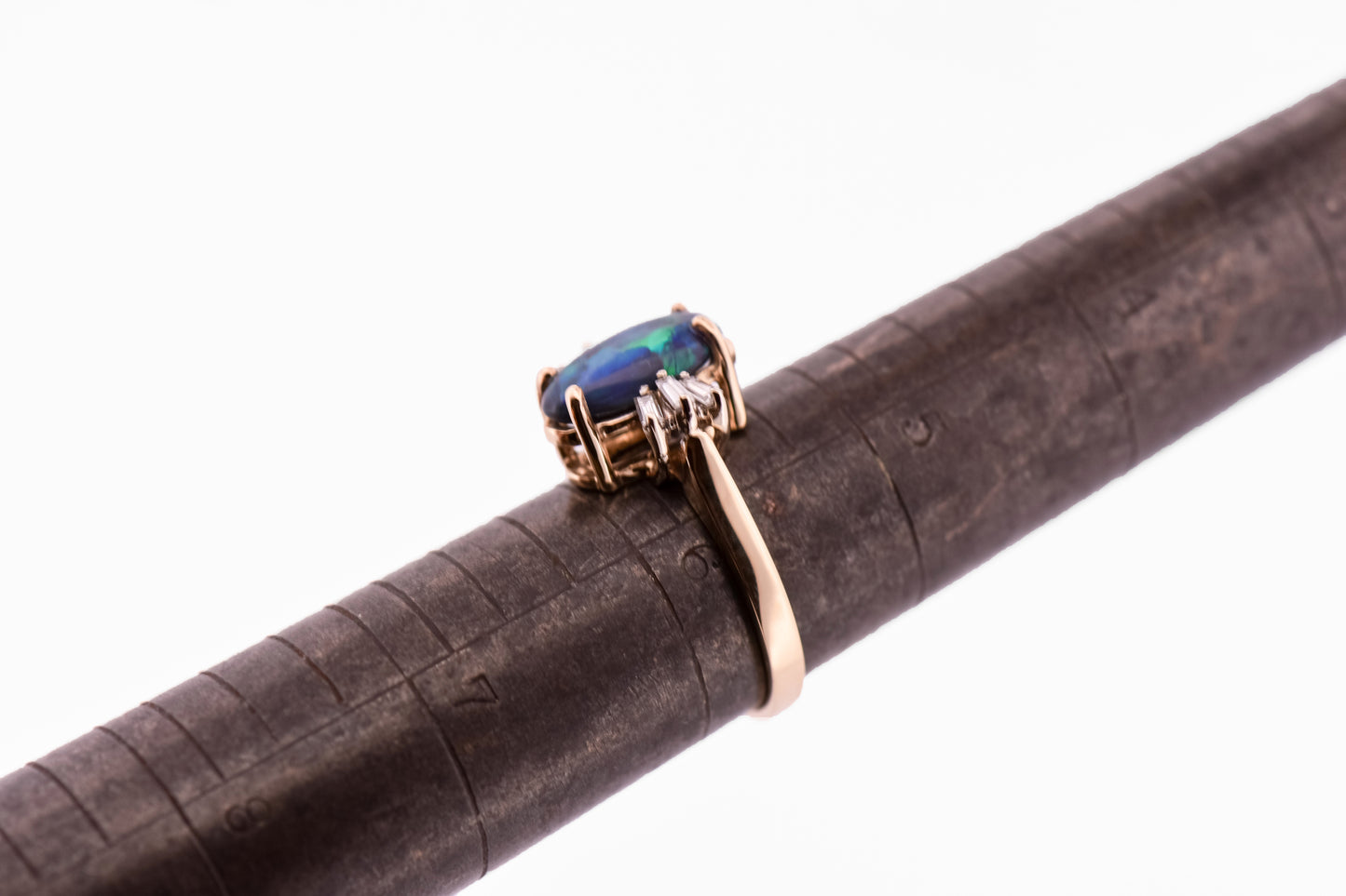 Blue-Green Black Opal Engagement Ring with Baguette Diamonds