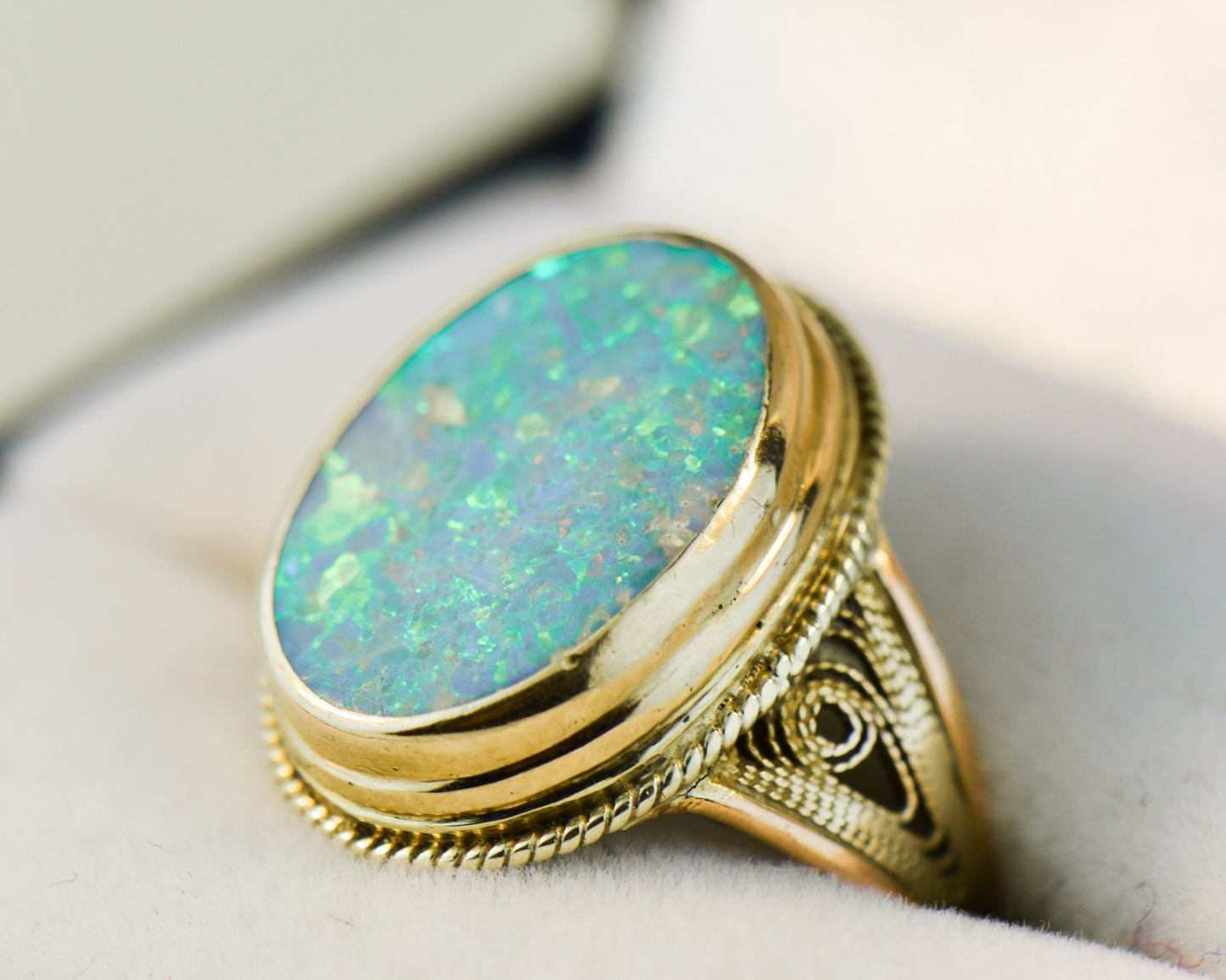 Top Quality Boulder Opal Set in Rope-Style Gold Ring