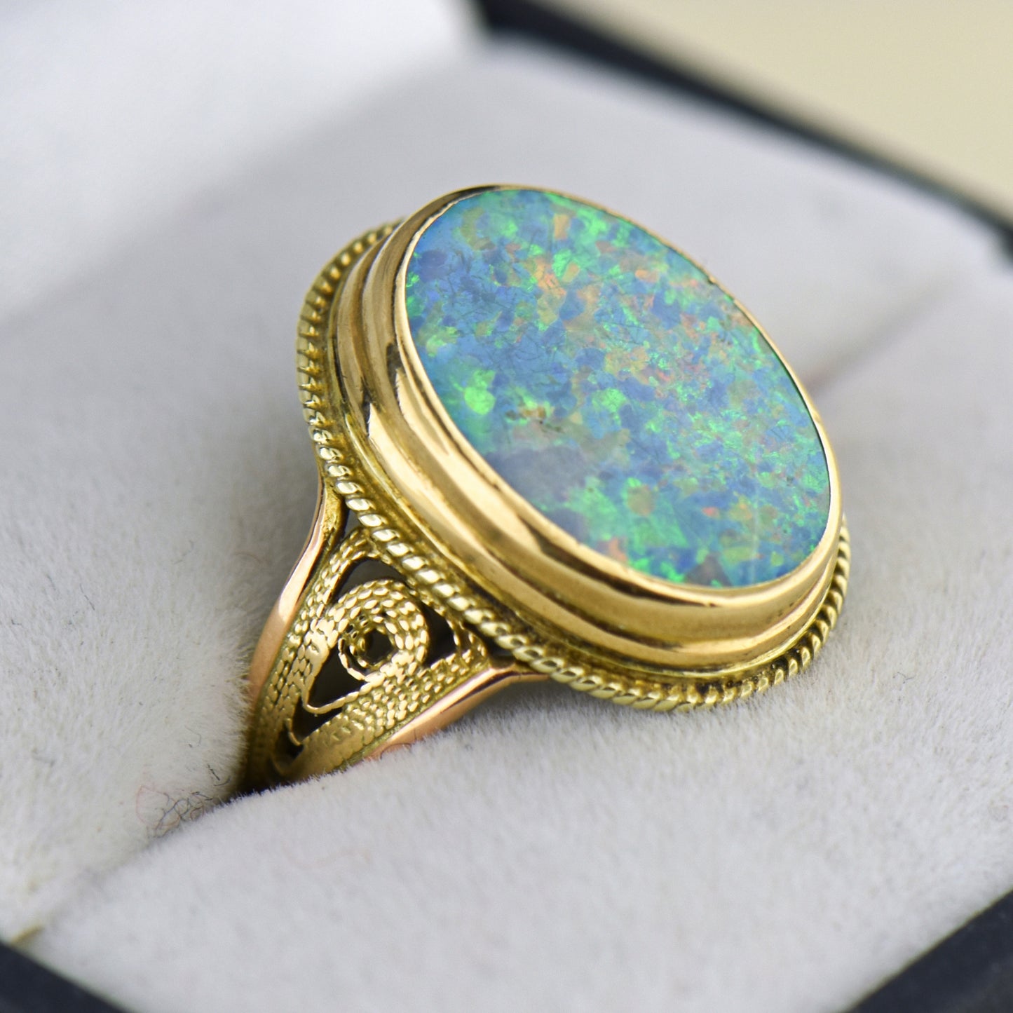 Top Quality Boulder Opal Set in Rope-Style Gold Ring