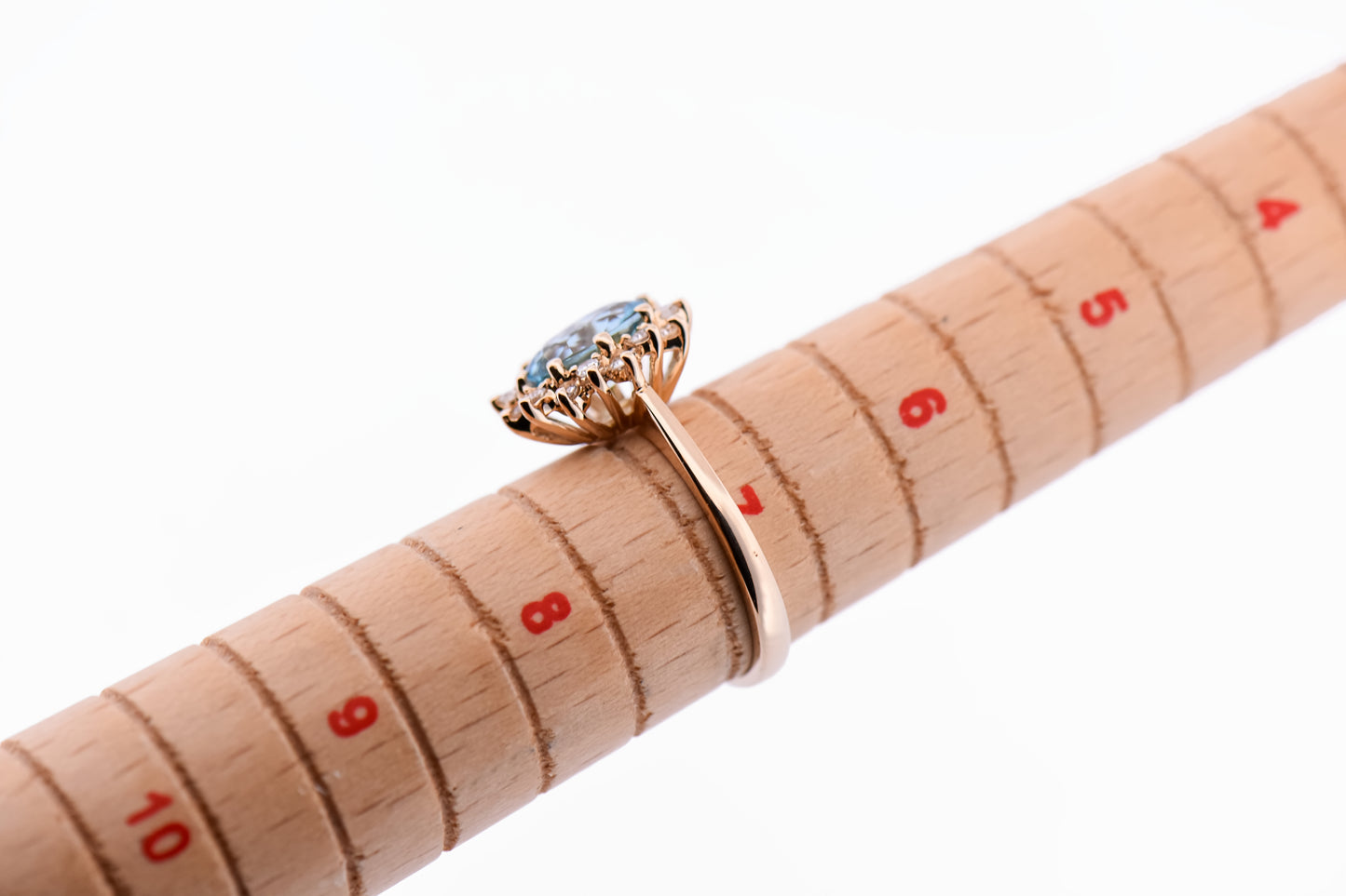 Classic Oval Aquamarine & Diamond Halo Ring in Yellow Gold