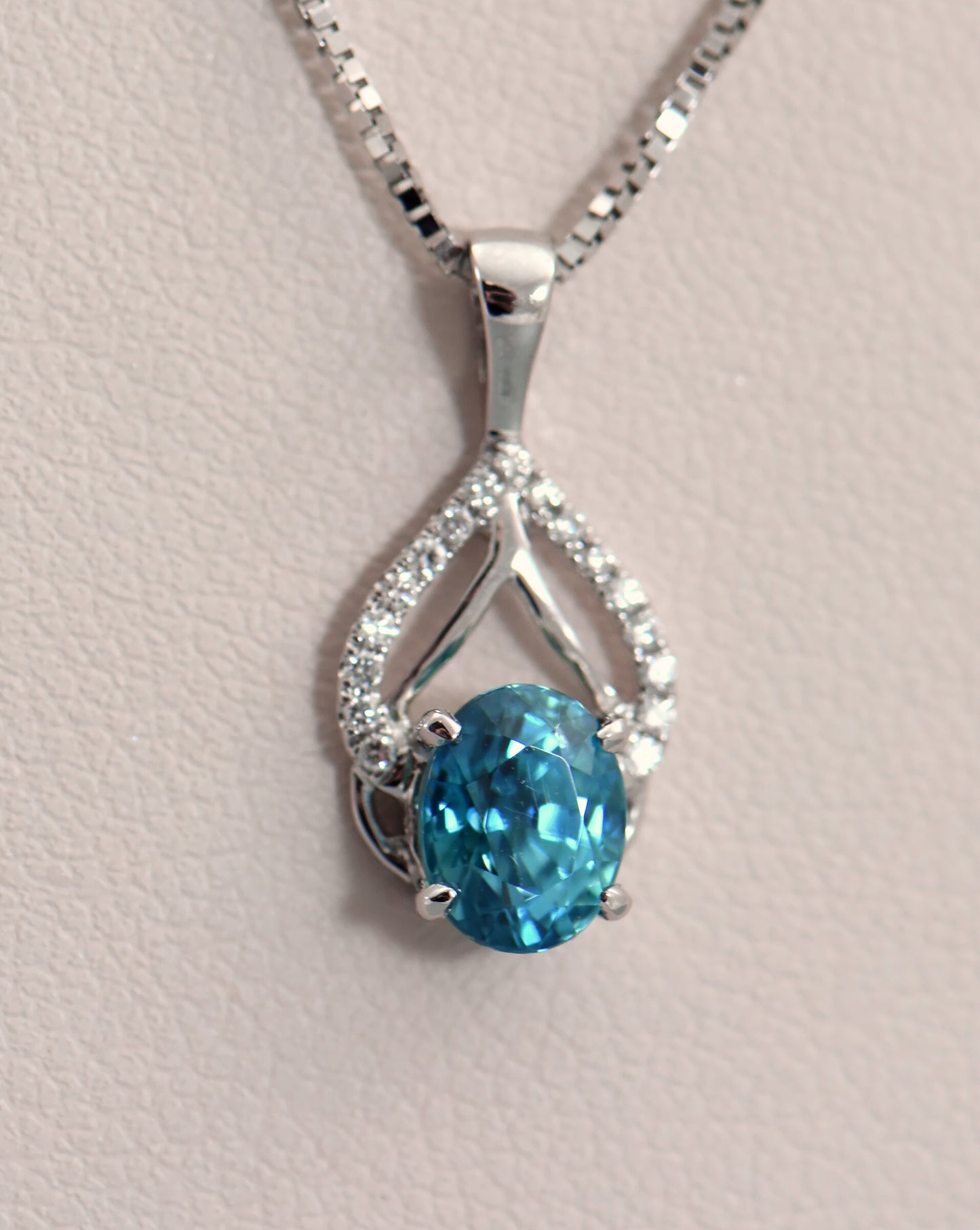 Dainty Deep Blue Zircon & Diamond Pendant in White Gold