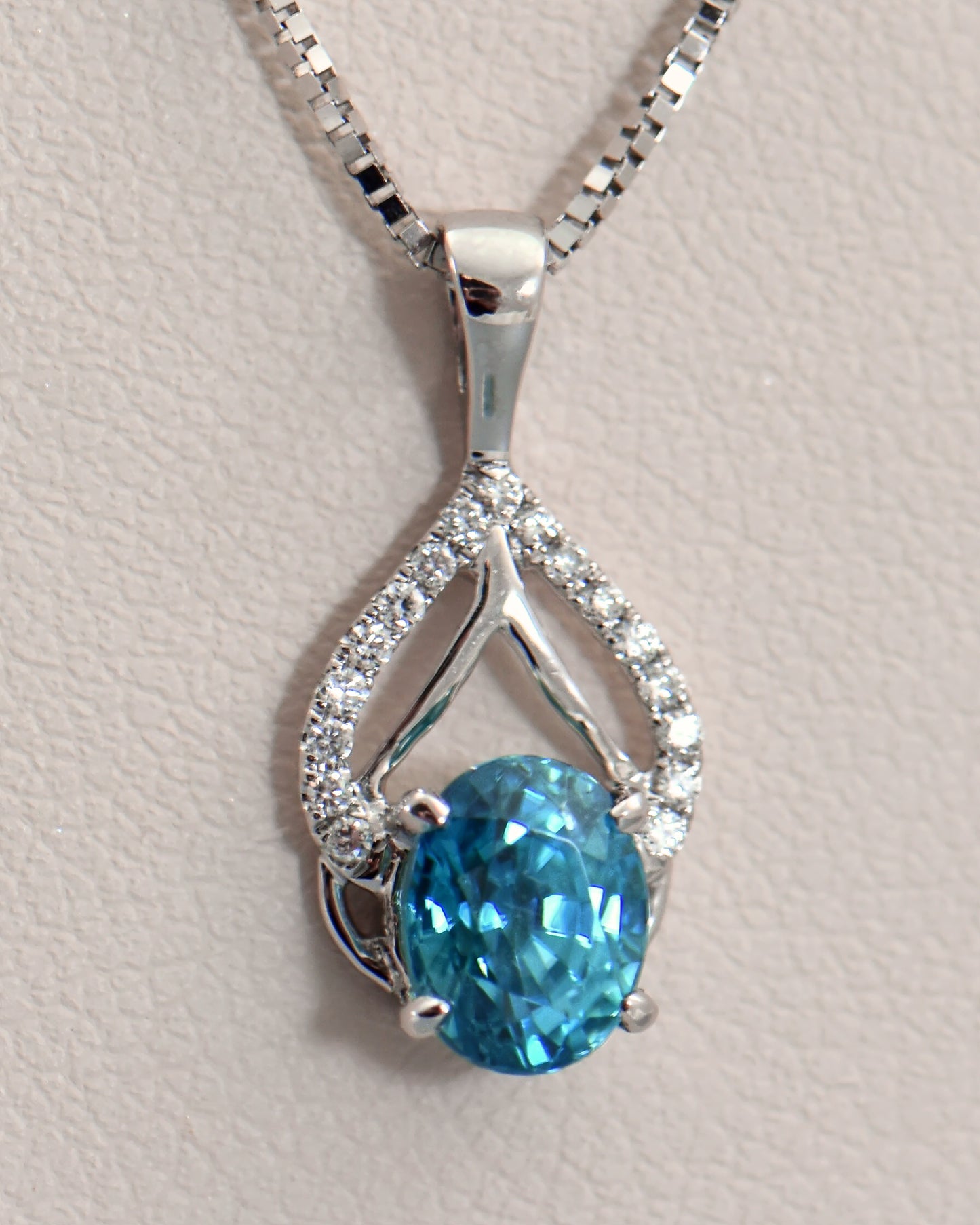 Dainty Deep Blue Zircon & Diamond Pendant in White Gold