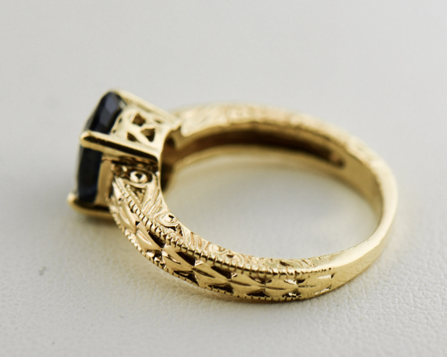 Navy Blue Sapphire Carved Yellow Gold Solitaire Ring