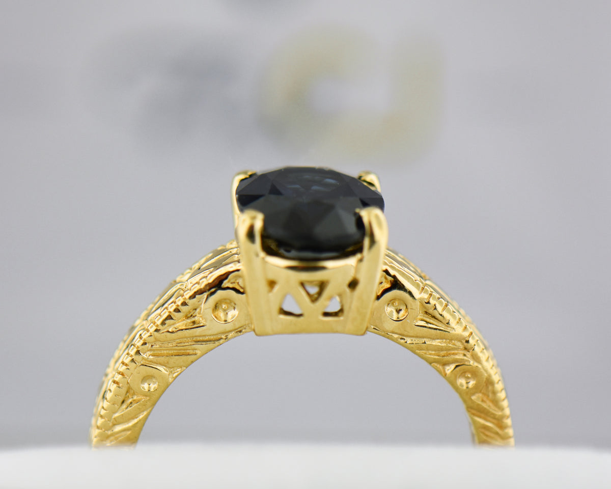 Navy Blue Sapphire Carved Yellow Gold Solitaire Ring