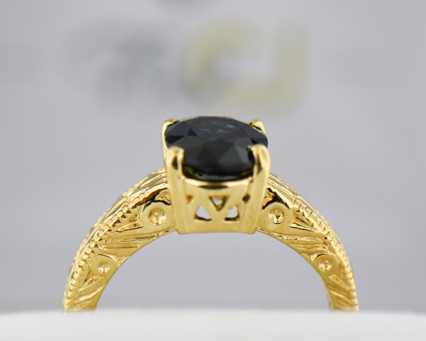 Navy Blue Sapphire Carved Yellow Gold Solitaire Ring