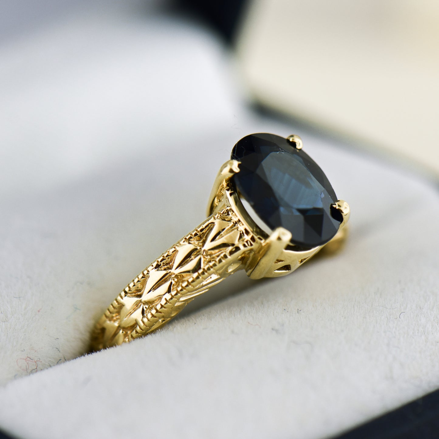 Navy Blue Sapphire Carved Yellow Gold Solitaire Ring