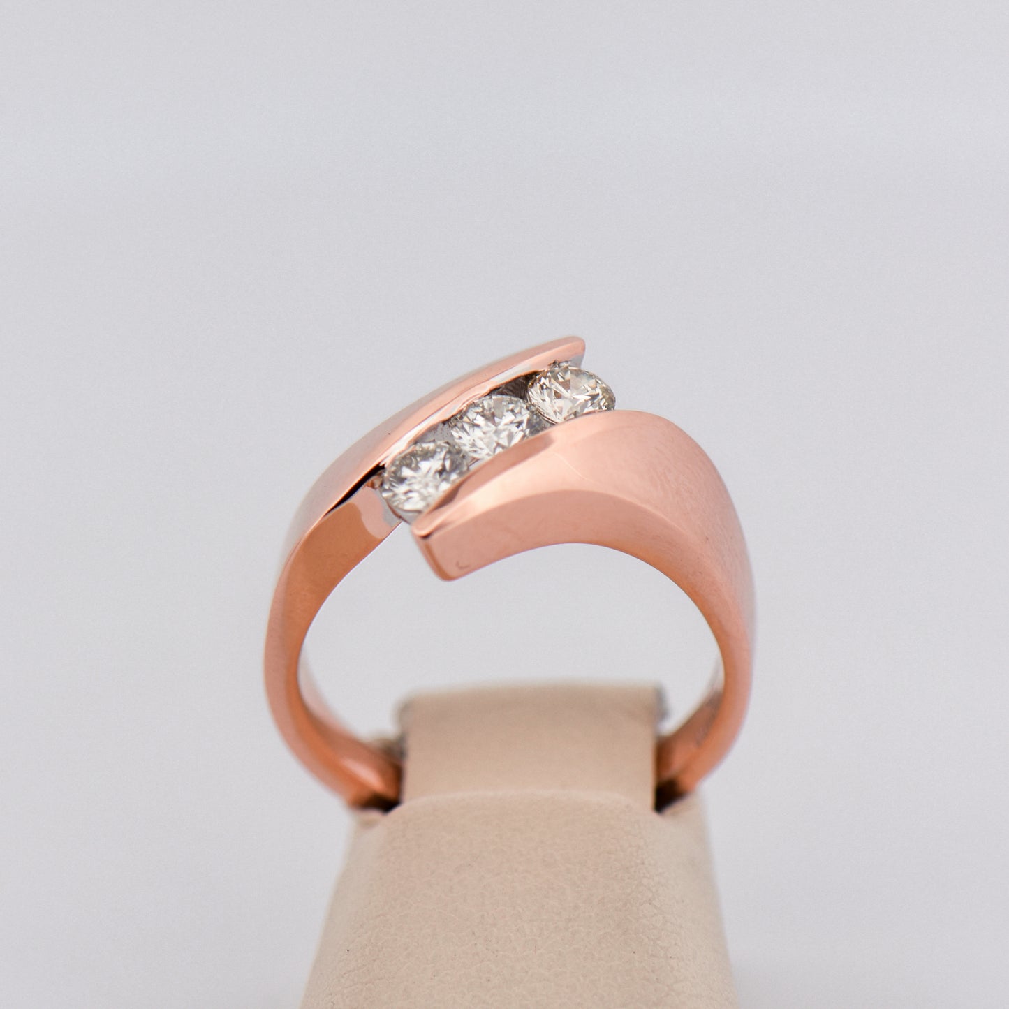 Three-Stone Diamond Channel Ring in Rose Gold
