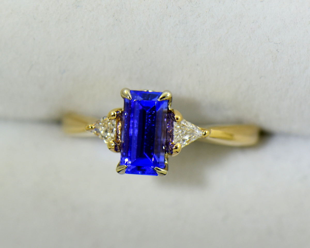 Dainty Emerald Cut Tanzanite & Trillion Diamond 3-Stone Ring