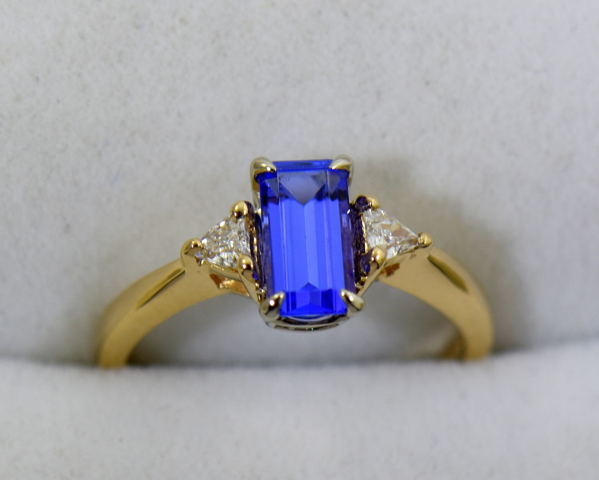 Dainty Emerald Cut Tanzanite & Trillion Diamond 3-Stone Ring