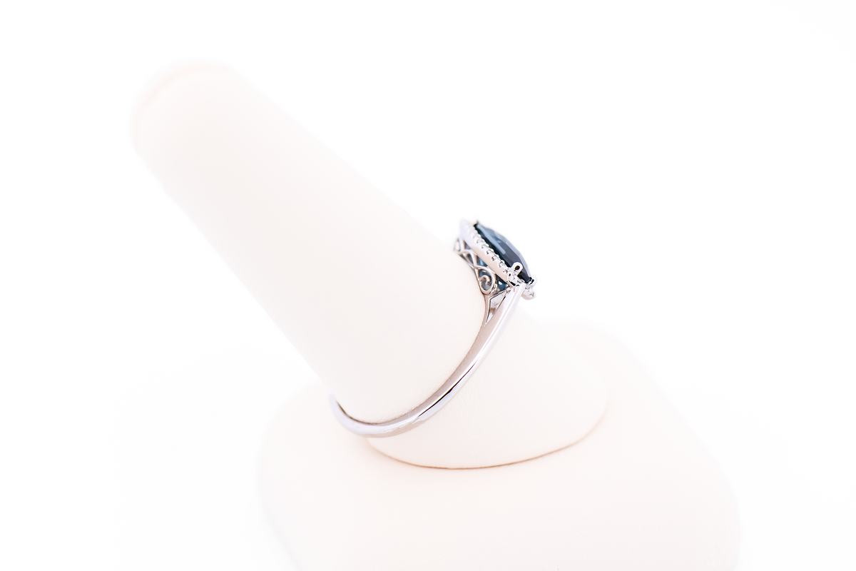 East-West Blue Topaz and Diamond Halo Ring
