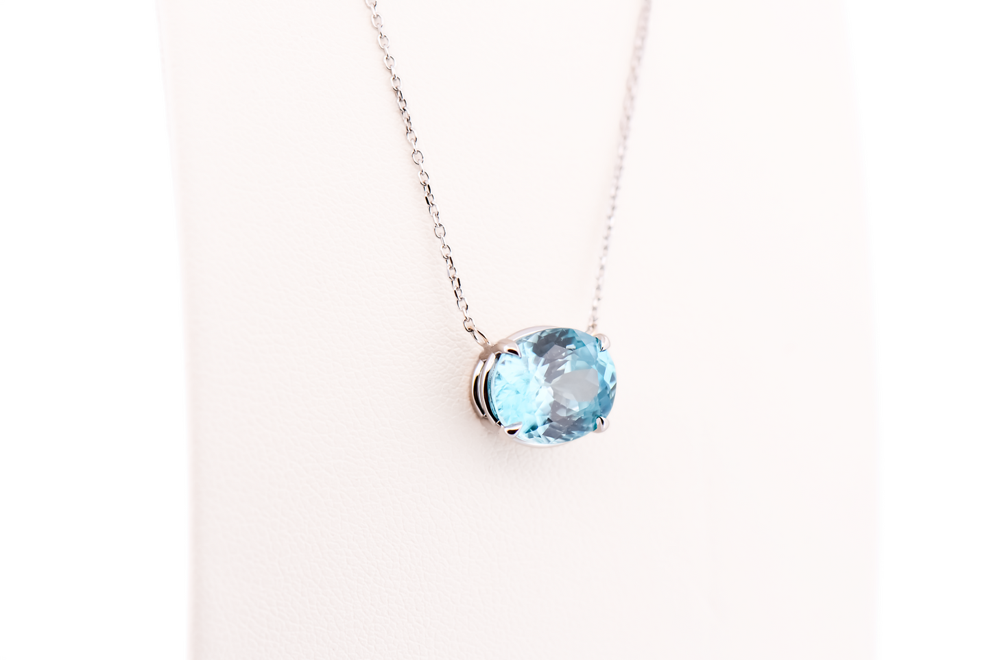 East-West Blue Zircon Solitaire Pendant in 14k White Gold