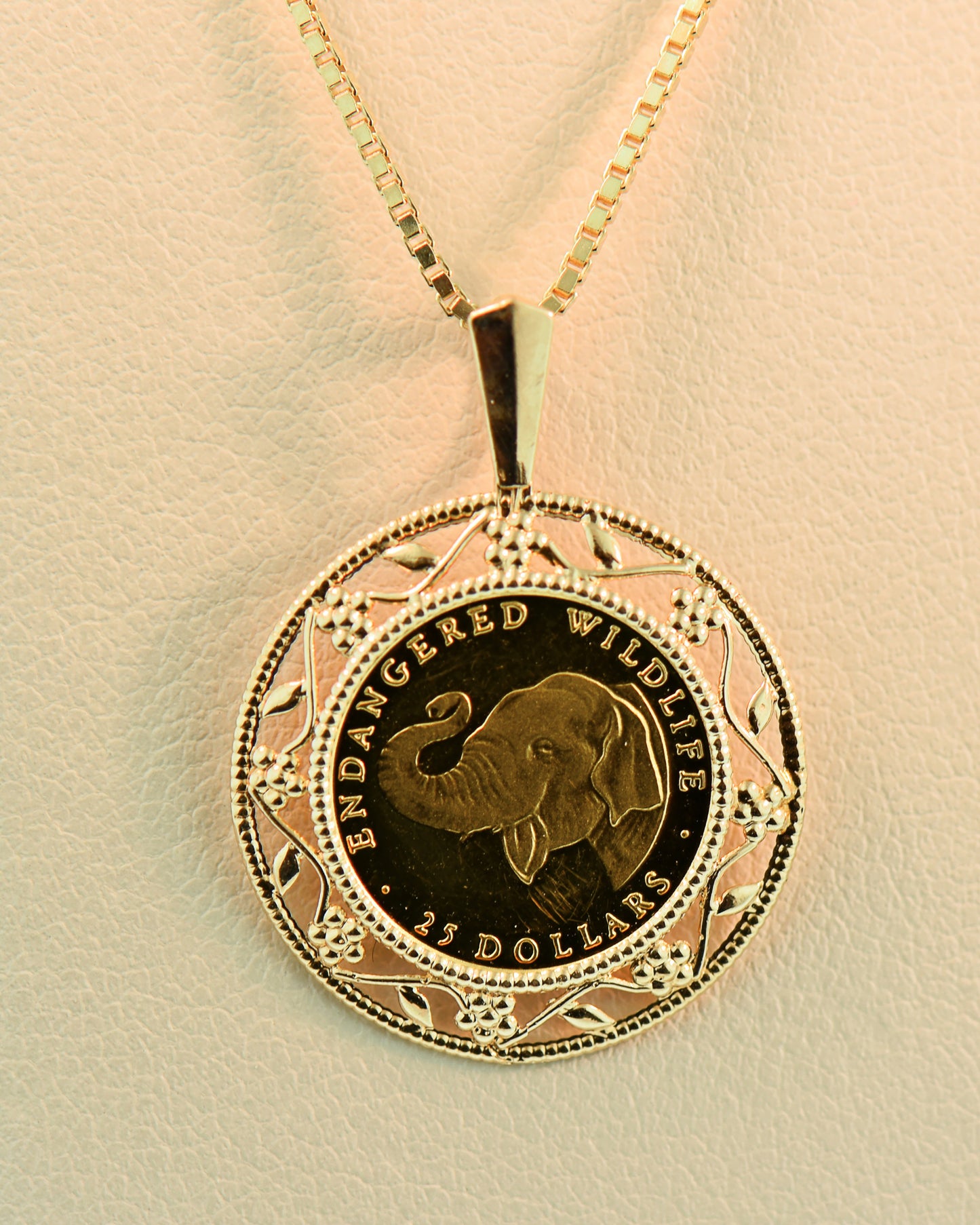 Framed Cook Islands Elephant Coin Pendant