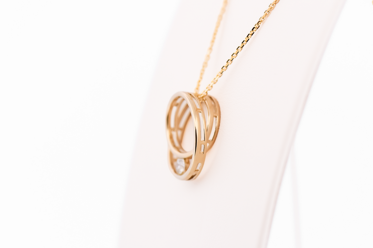 Eternal Circle Pendant in 14k Yellow Gold with Diamond Accent