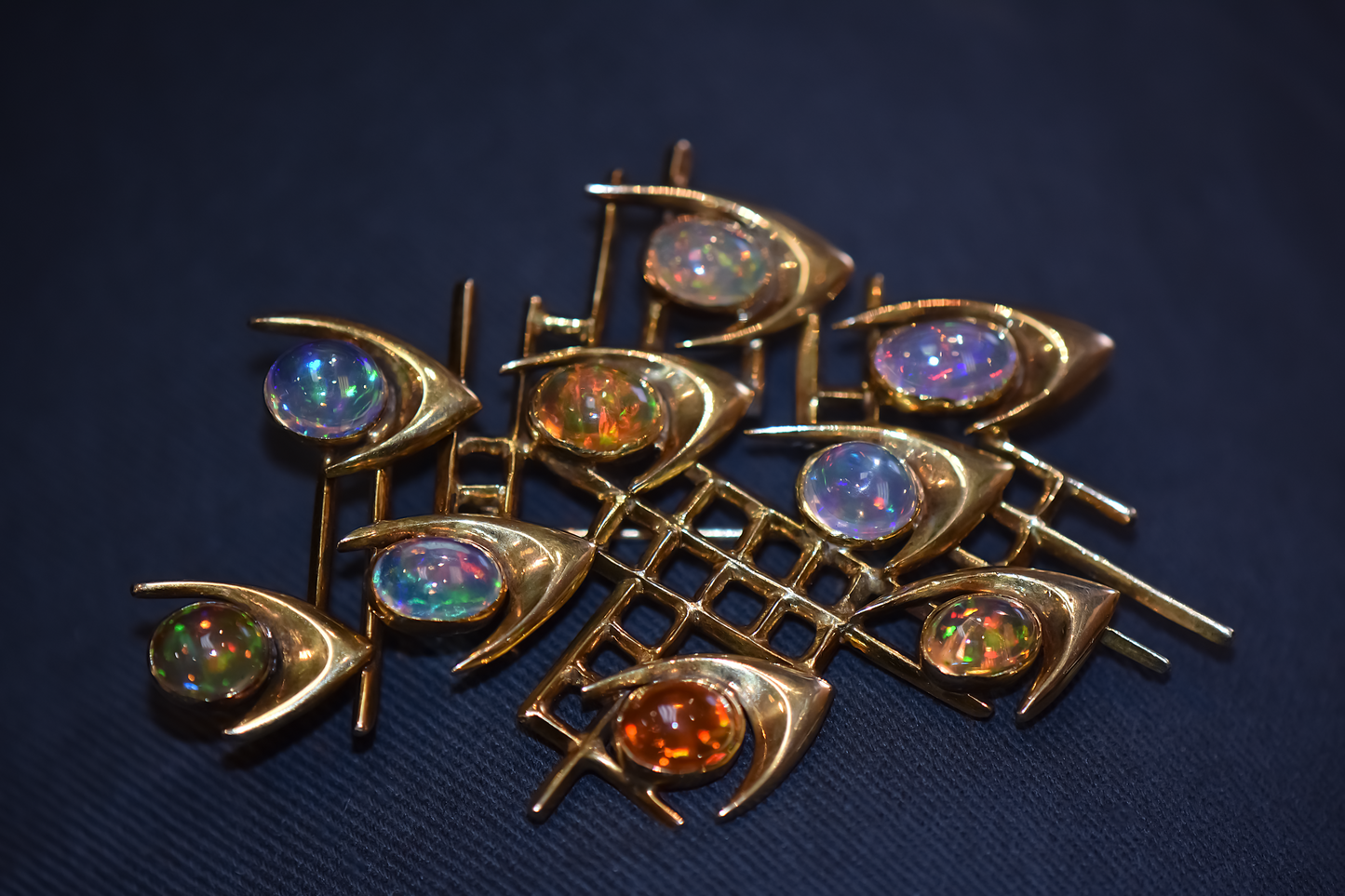 Exceptional Mid-Century Modern "School of Fish" Gold Brooch with Mexican Fire Opals