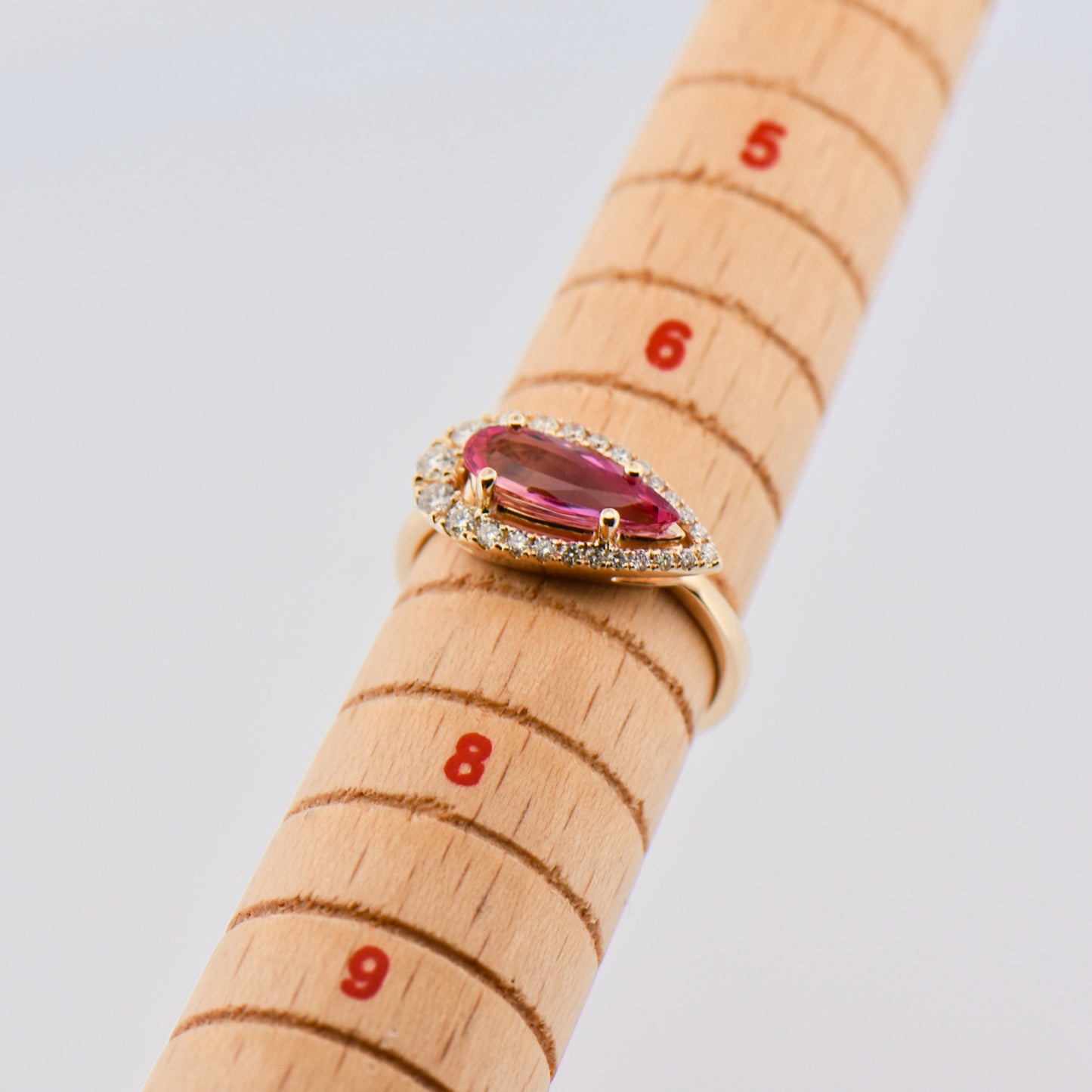 Imperial Topaz and Diamond Halo Ring in Yellow Gold