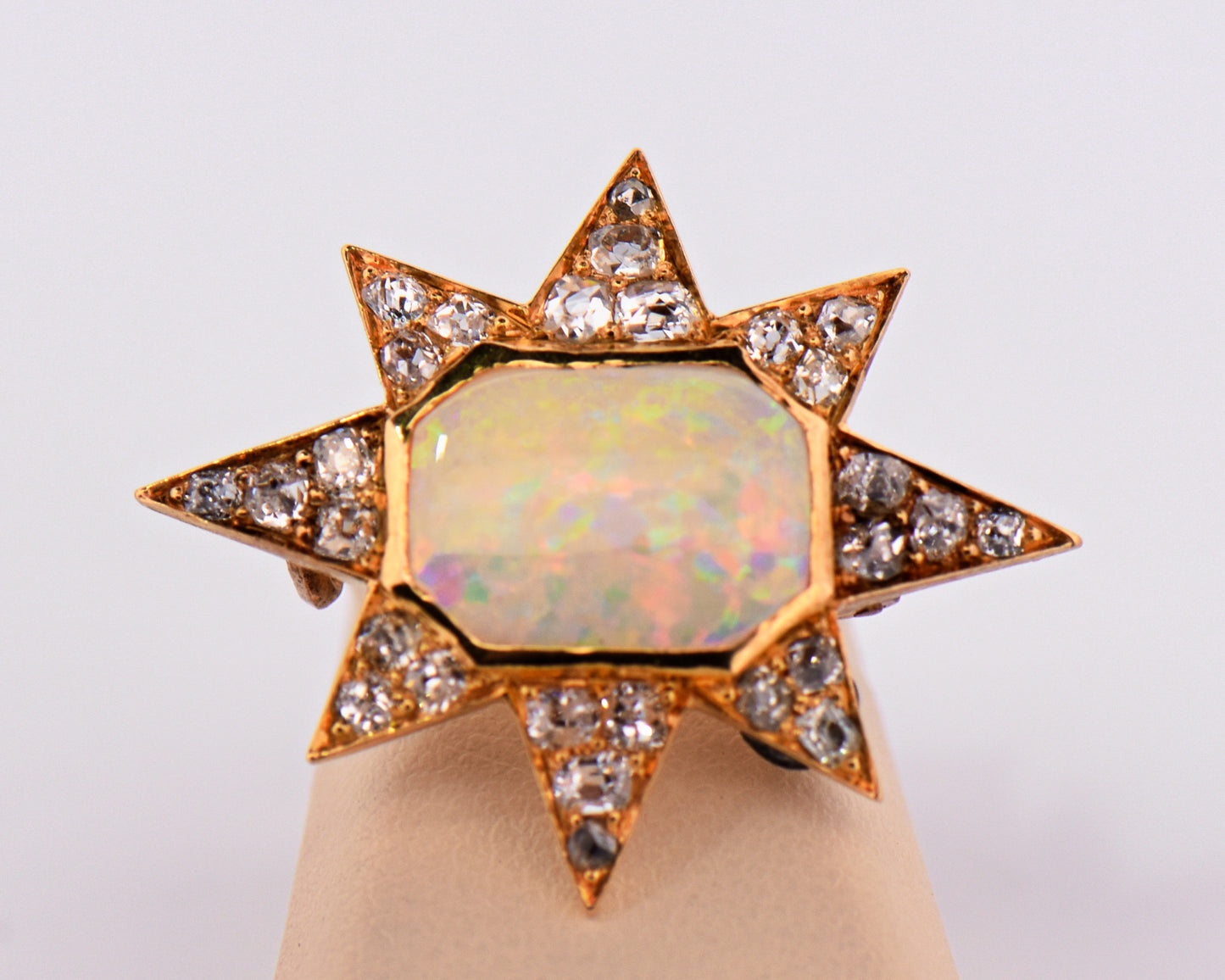 Victorian Gold Star Brooch with Opal and Diamonds
