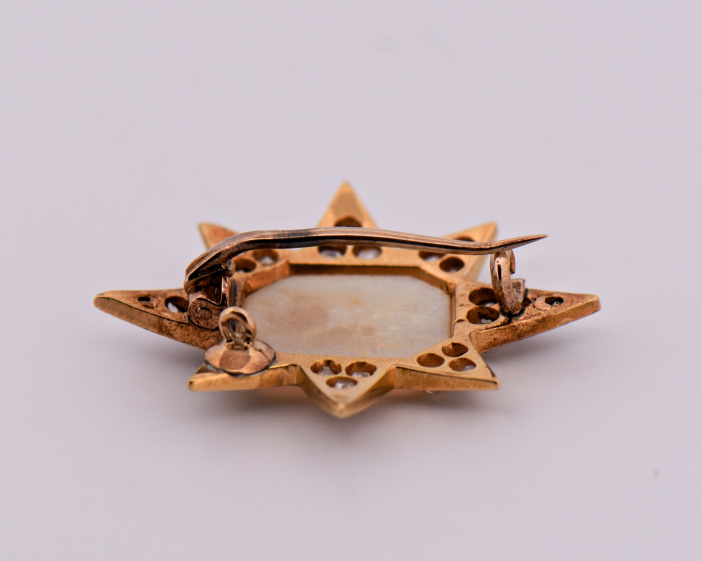 Victorian Gold Star Brooch with Opal and Diamonds