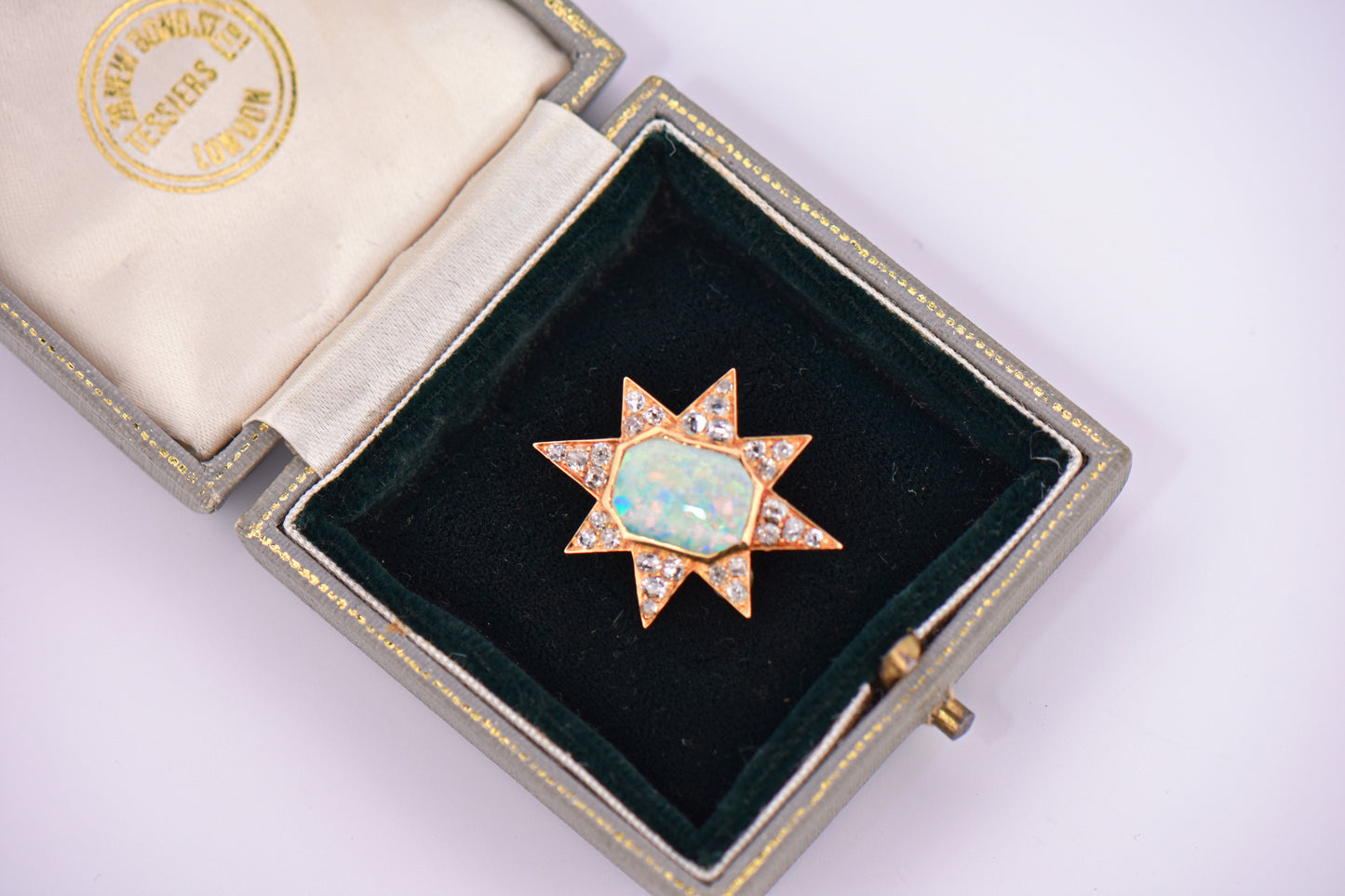 Victorian Gold Star Brooch with Opal and Diamonds