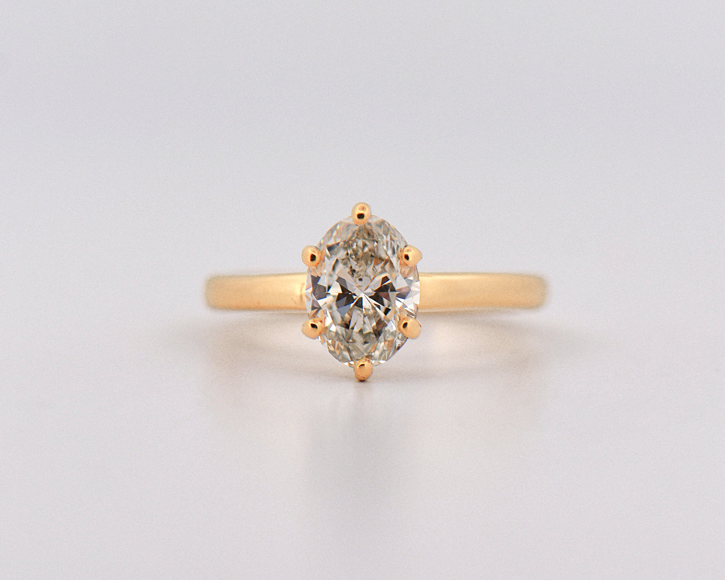Oval Diamond Solitaire Ring in 18k Yellow Gold