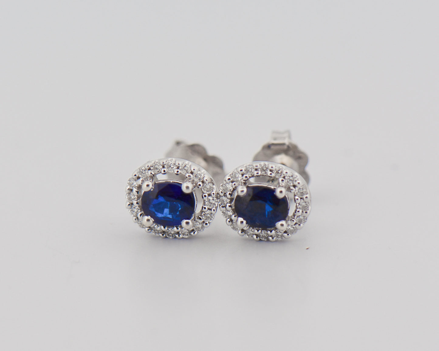 Oval Sapphire Halo Stud Earrings 14kw 1ctw sap d.25