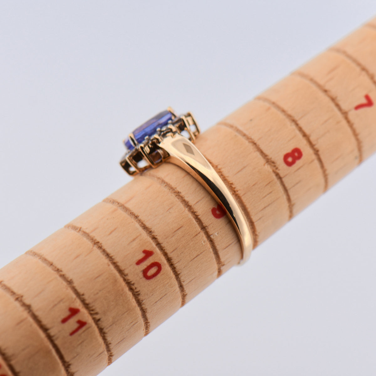 Oval Tanzanite & Diamond Halo Ring