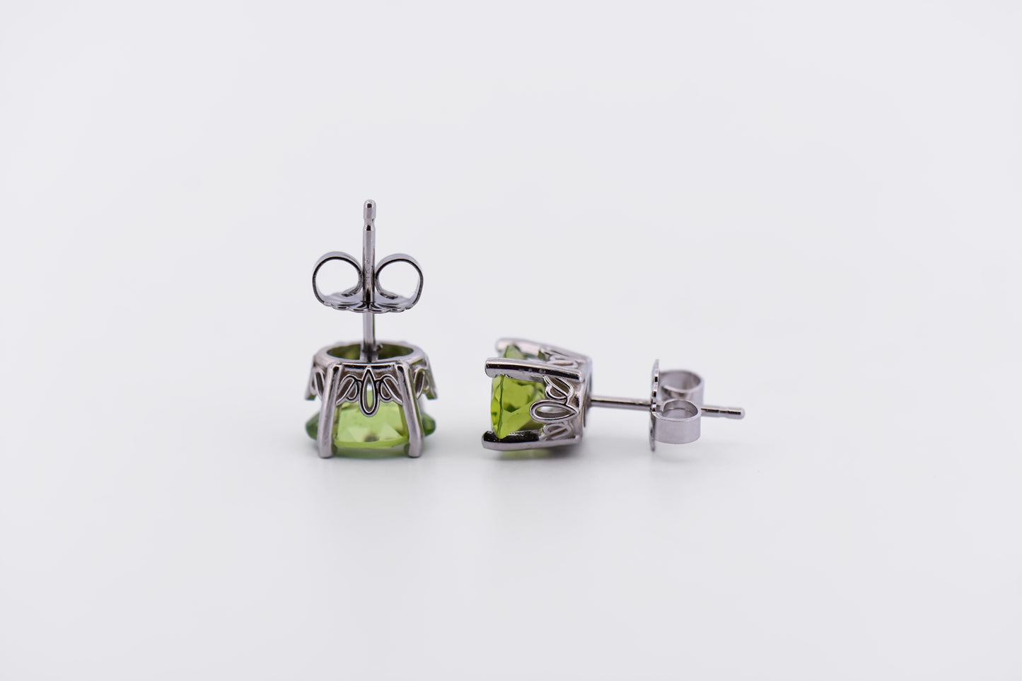 Oval Peridot Stud Earrings in White Gold