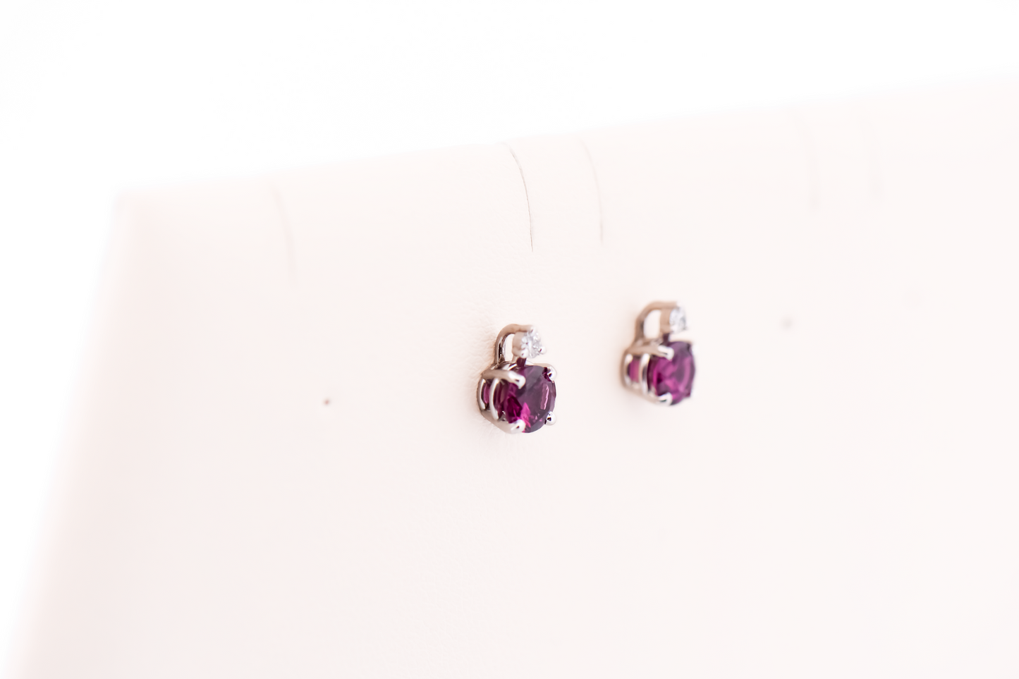 Reddish Purple Rhodolite Garnet & Diamond Stud Earrings in White Gold