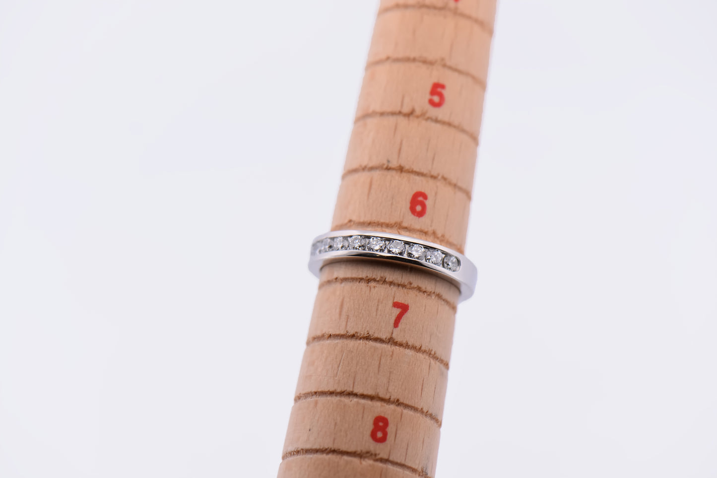 Round Diamond Channel Band in Platinum