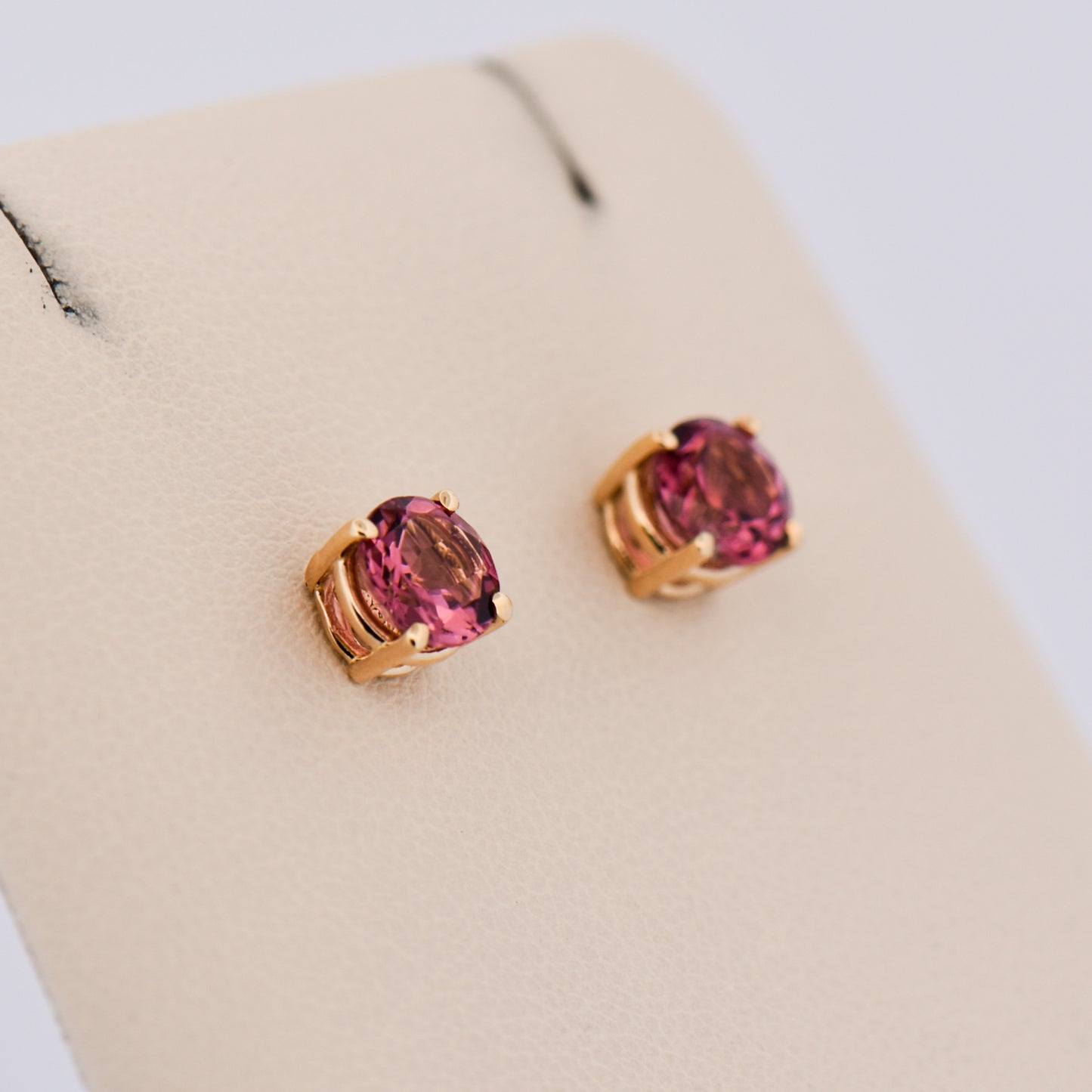 Round Pink Tourmaline Studs in Yellow Gold