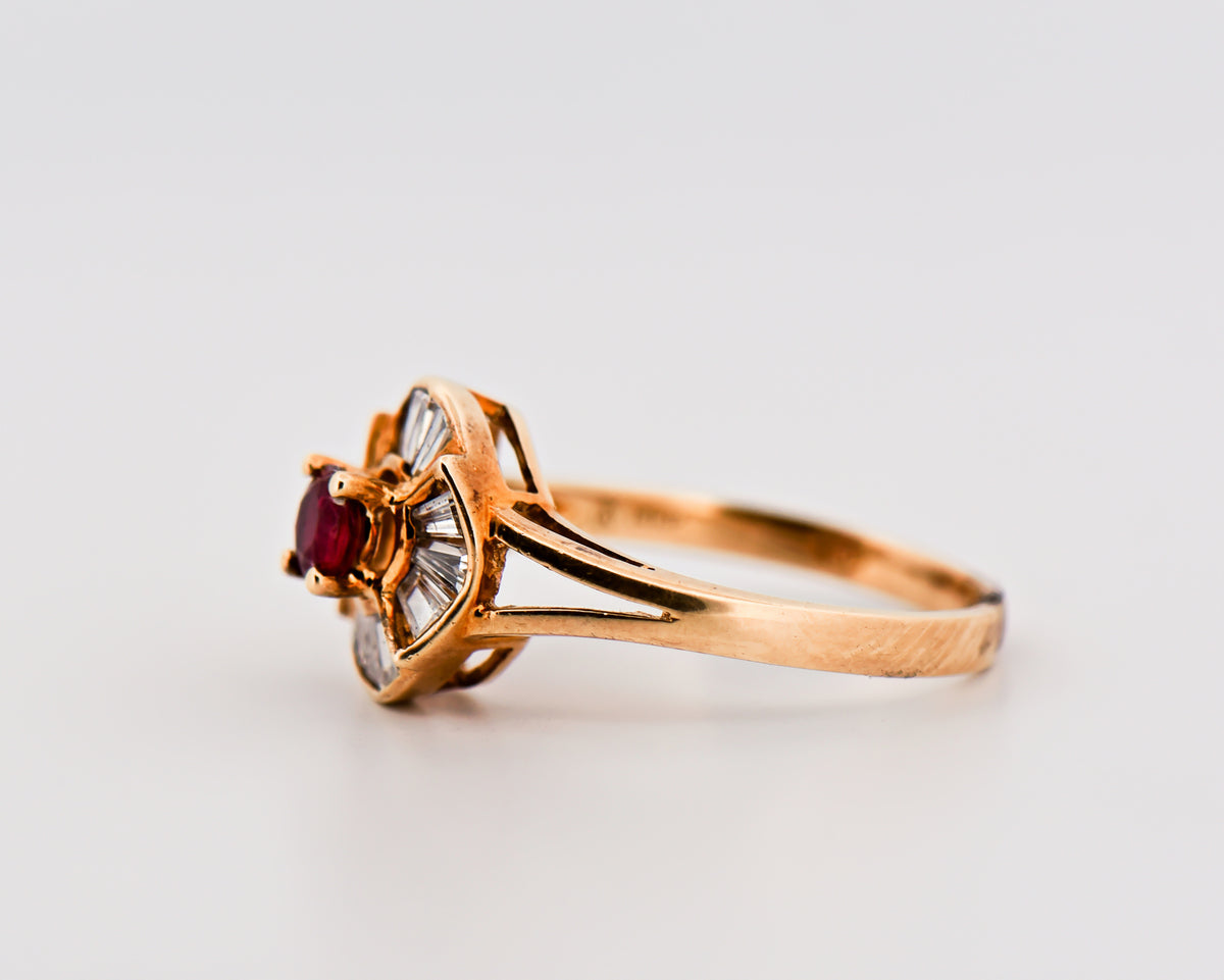 Round Ruby Halo Ring in Yellow Gold
