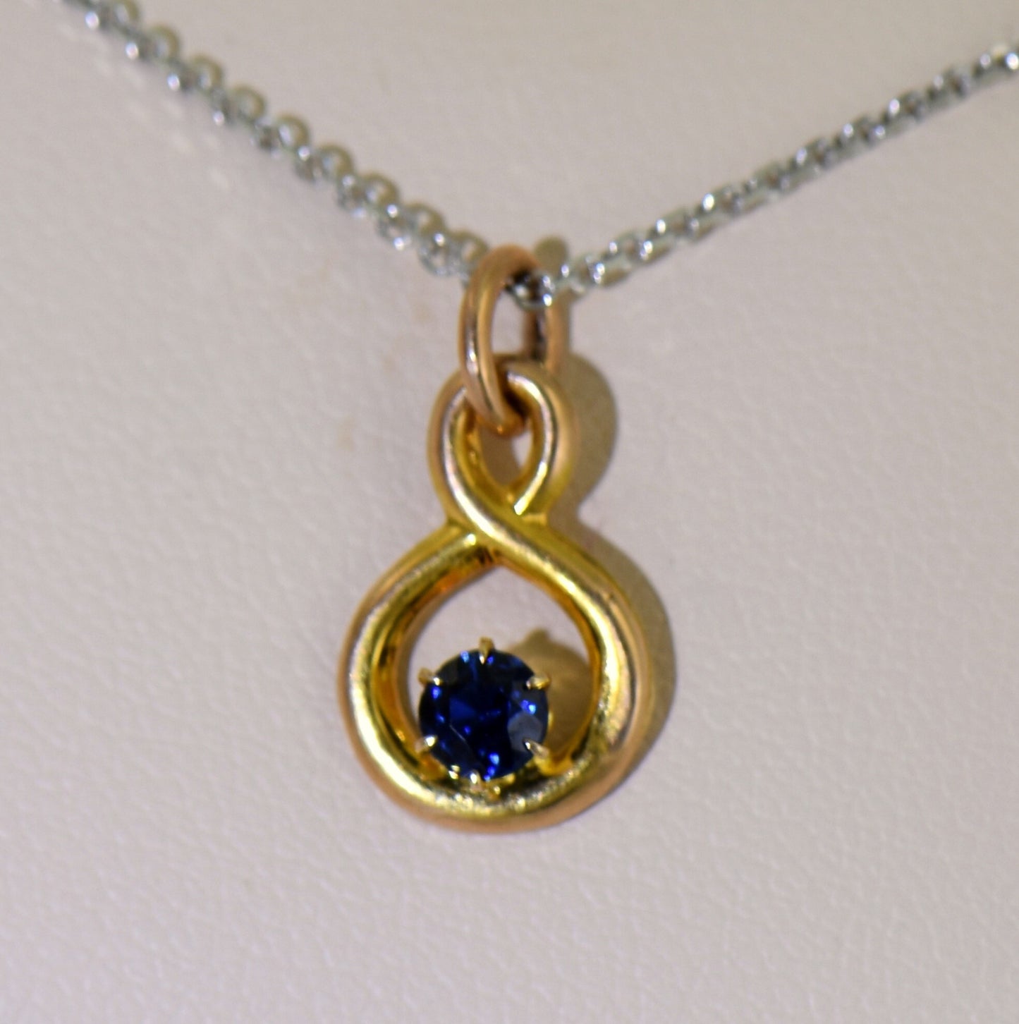 Edwardian Sapphire Infinity Charm Pendant