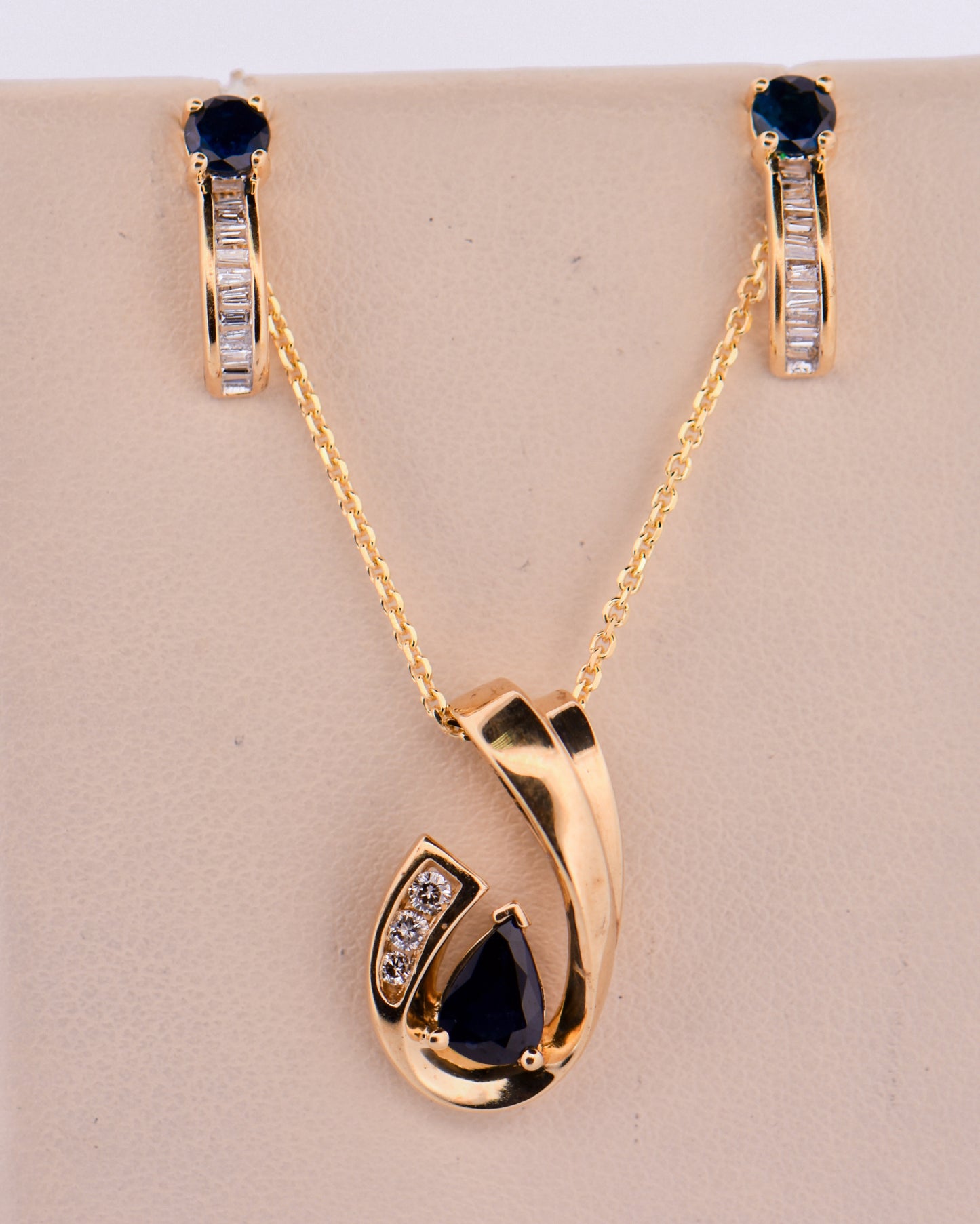 Sapphire Slide Pendant 10ky s.75ct pear d.09ct