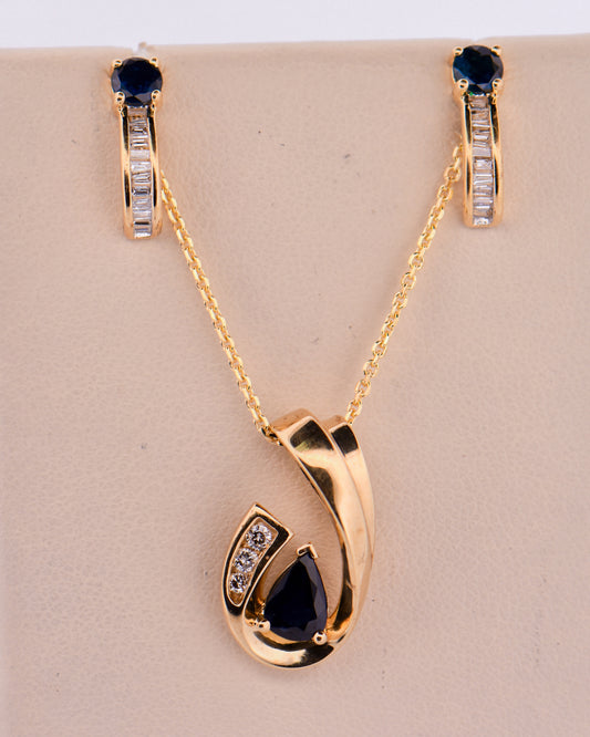 Sapphire Slide Pendant 10ky s.75ct pear d.09ct
