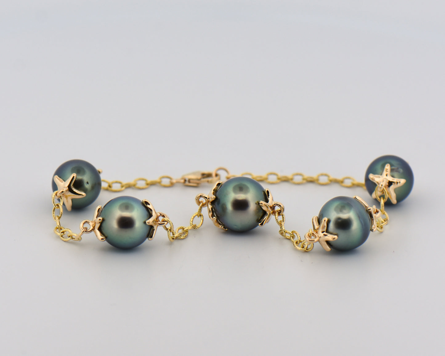 Tahition Pearl Station Bracelet with Starfish Design