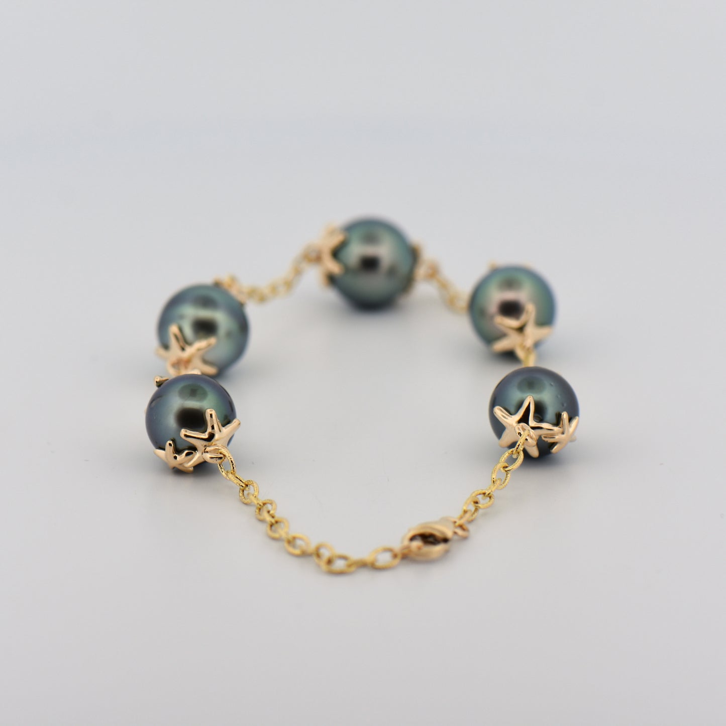 Tahition Pearl Station Bracelet with Starfish Design