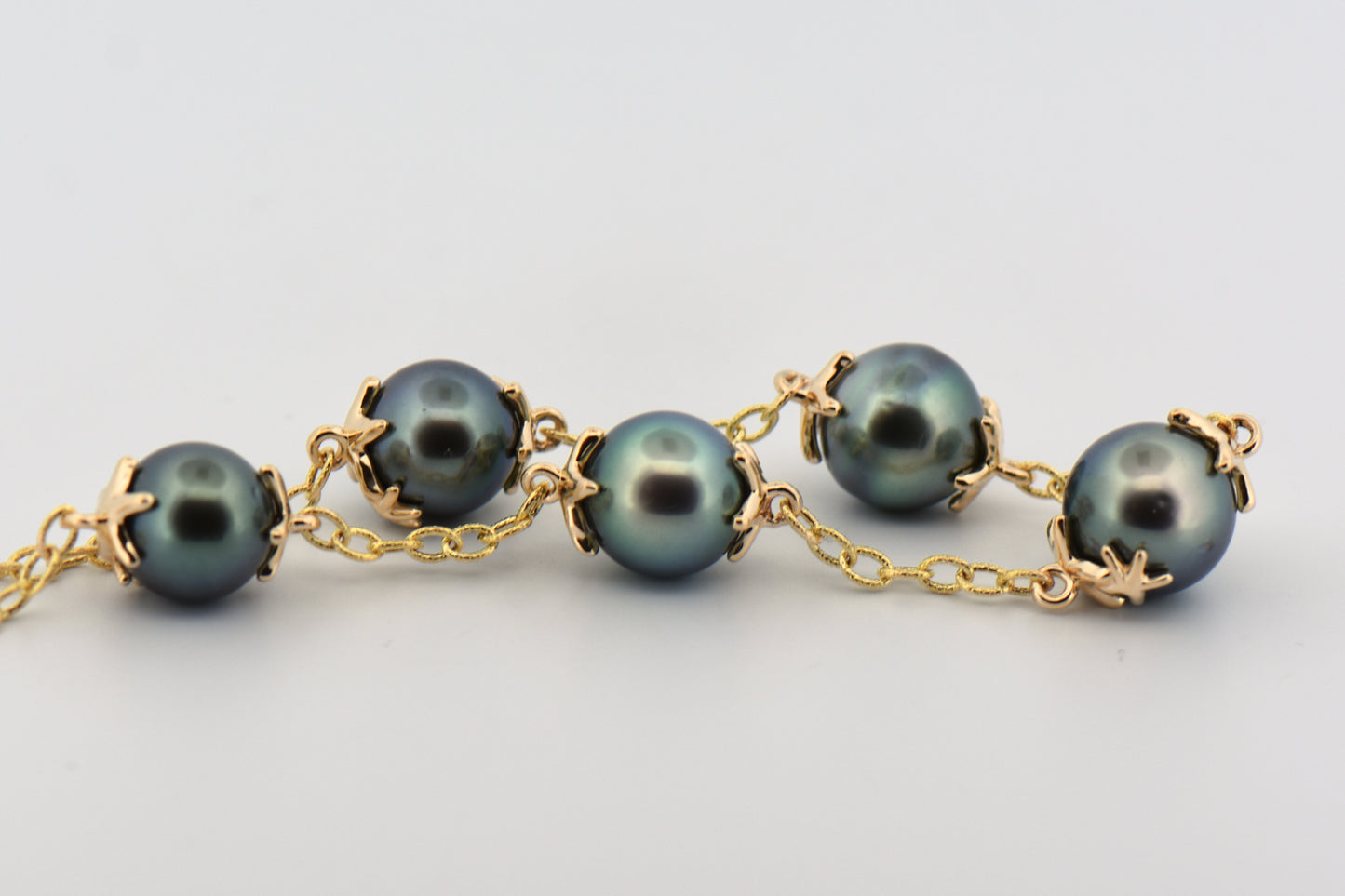 Tahition Pearl Station Bracelet with Starfish Design