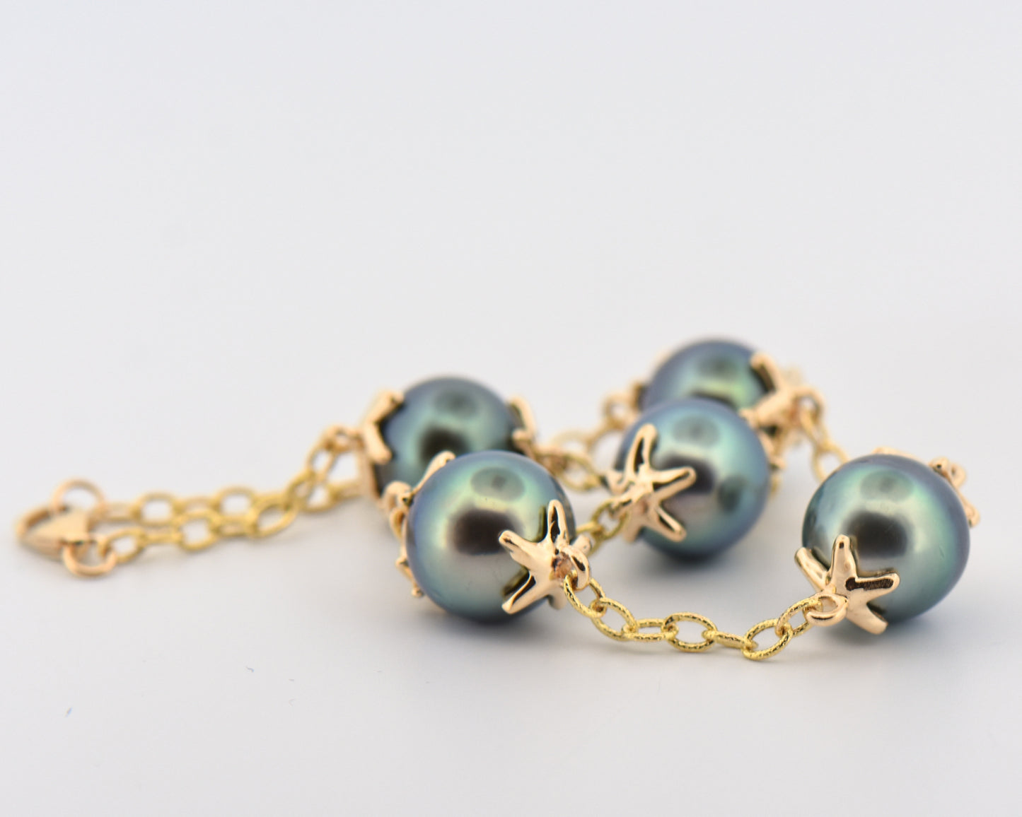 Tahition Pearl Station Bracelet with Starfish Design