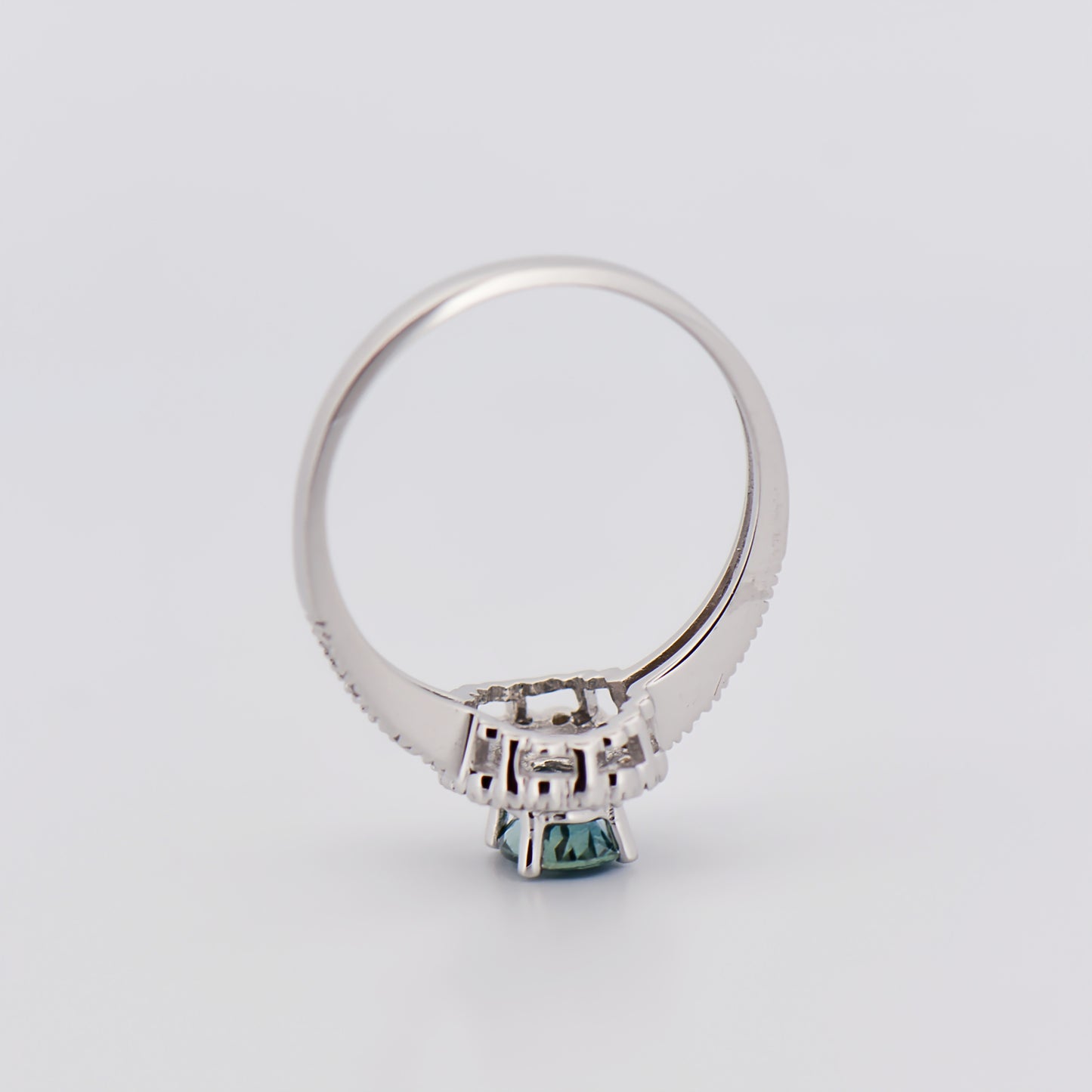 Teal Sapphire Halo Engagment Ring in White Gold