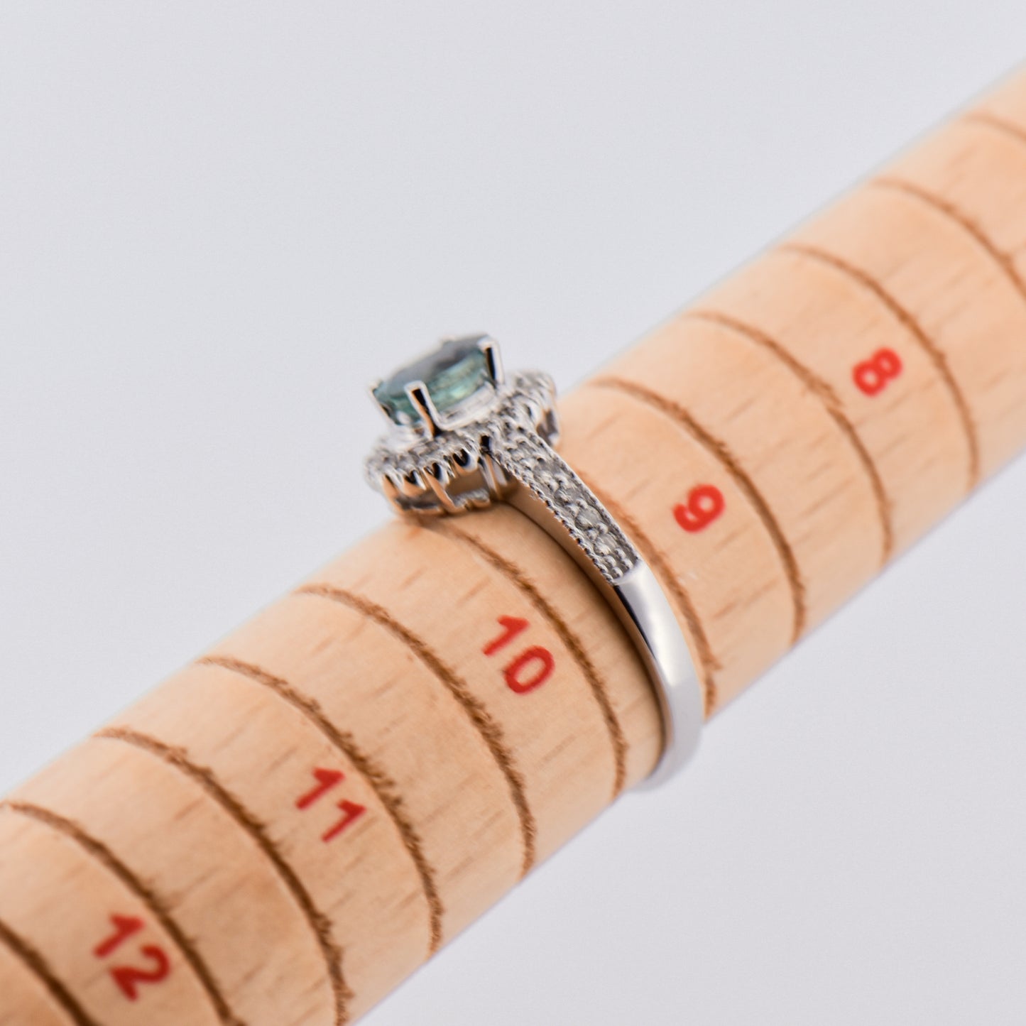 Teal Sapphire Halo Engagment Ring in White Gold
