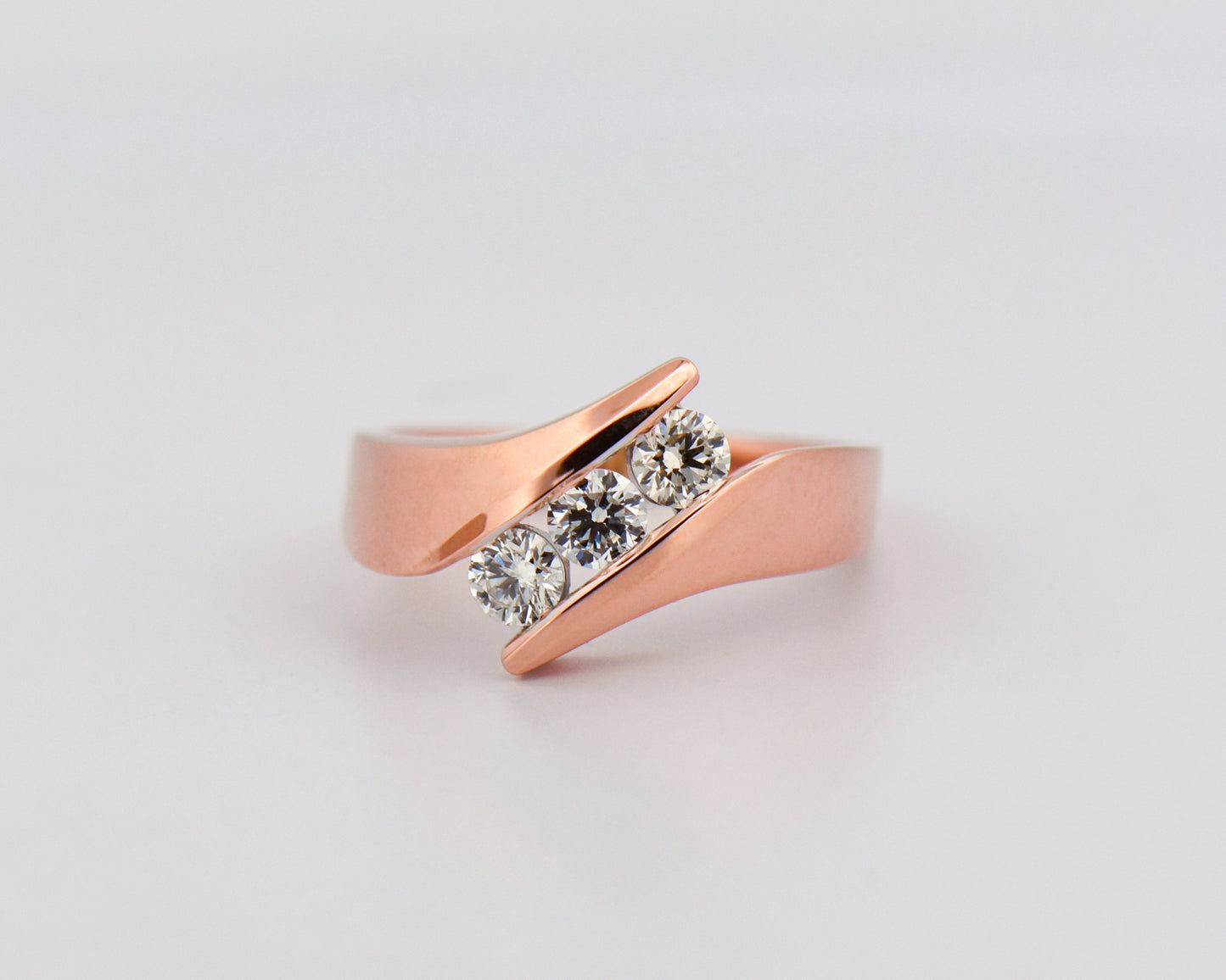 Three-Stone Diamond Channel Ring in Rose Gold