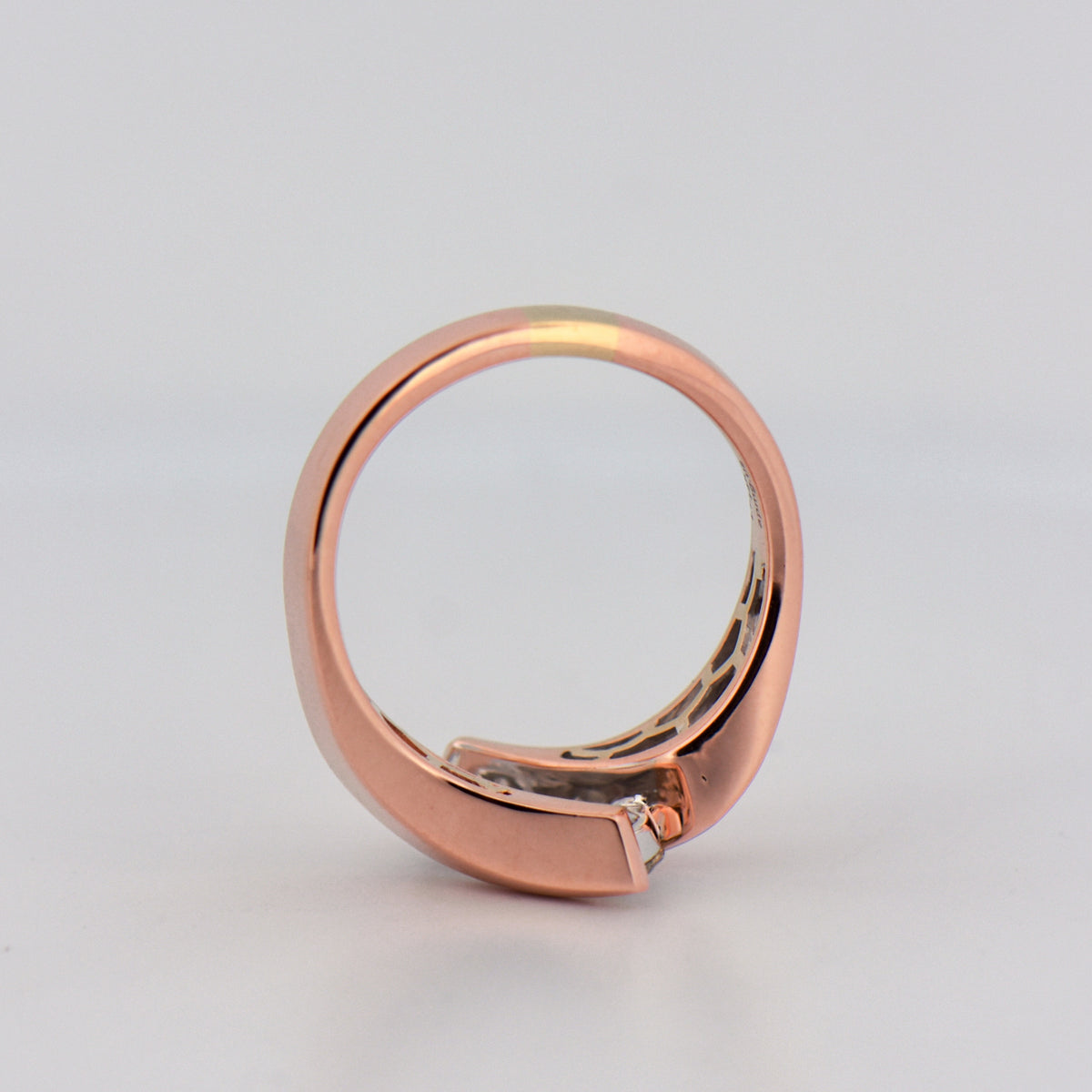 Three-Stone Diamond Channel Ring in Rose Gold