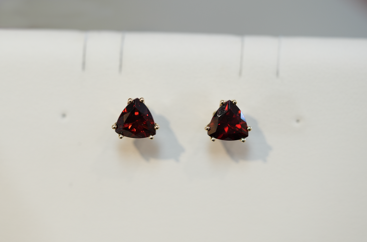 Unusual Trillion Cut Red Garnet Stud Earrings in Yellow Gold