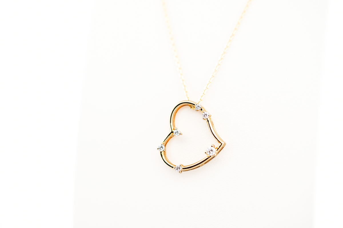 Yellow Gold & Diamond Heart Pendant - Twisted "Witch's Heart" Shape