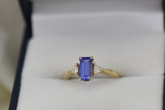Dainty Emerald Cut Tanzanite & Trillion Diamond 3-Stone Ring