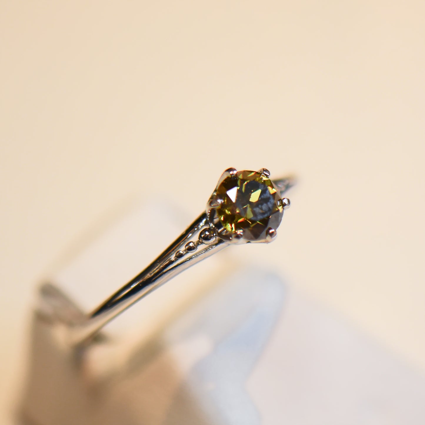 Antique Platinum Solitaire Ring with Olive Green Diamond
