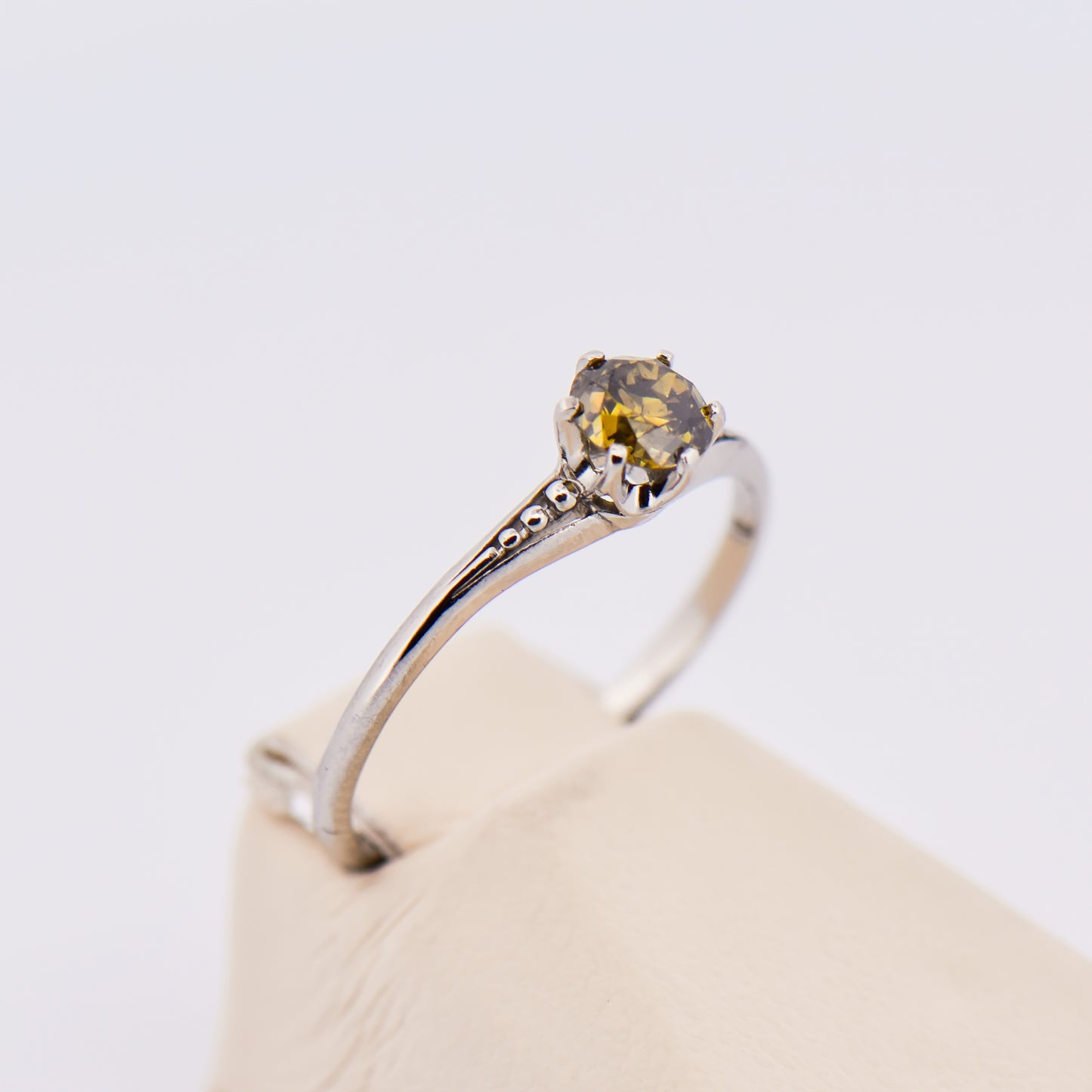 Antique Platinum Solitaire Ring with Olive Green Diamond